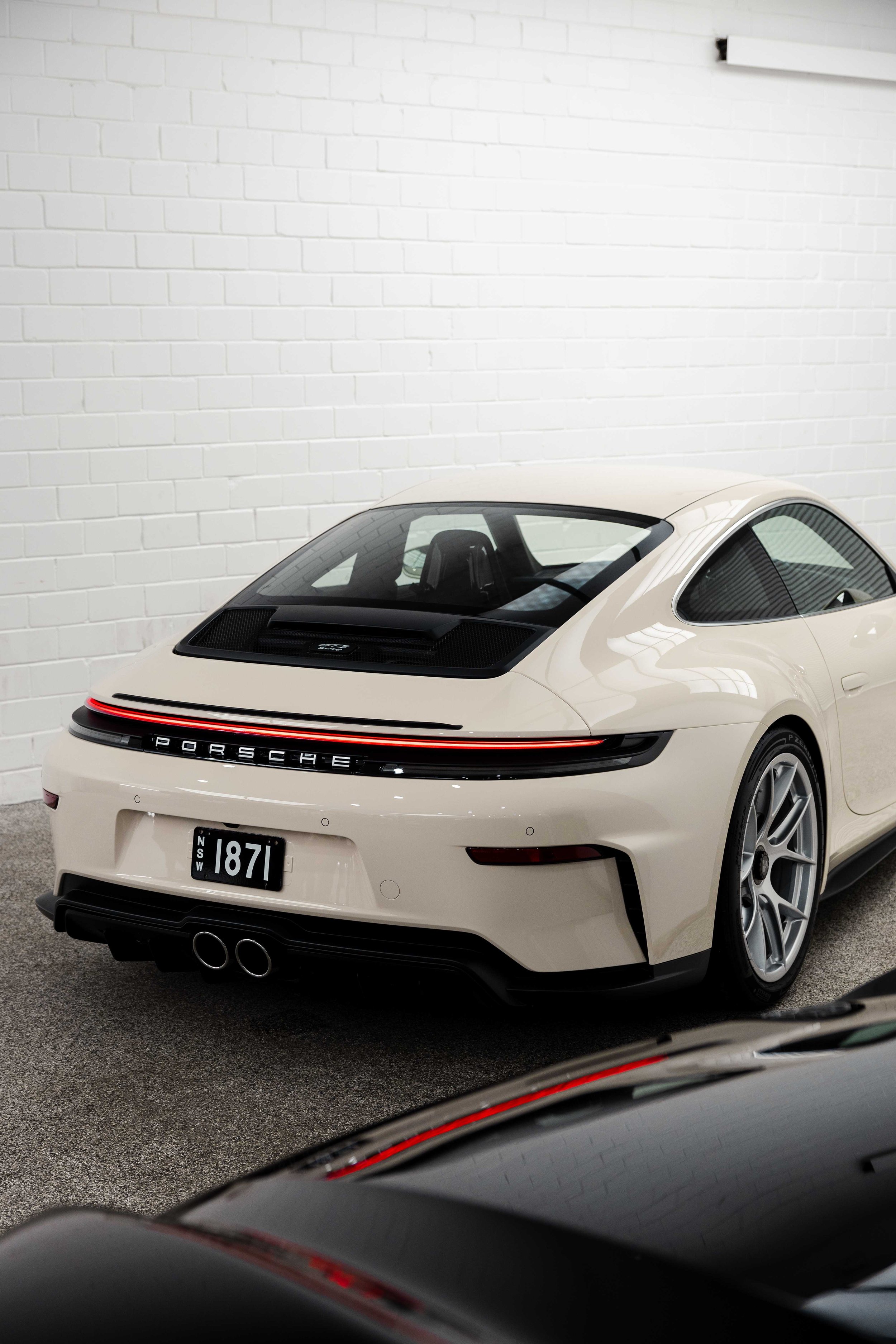 Cream Porsche 911 GT3 Touring rear three quarter with XPEL Paint Protection Film in Mona Vale
