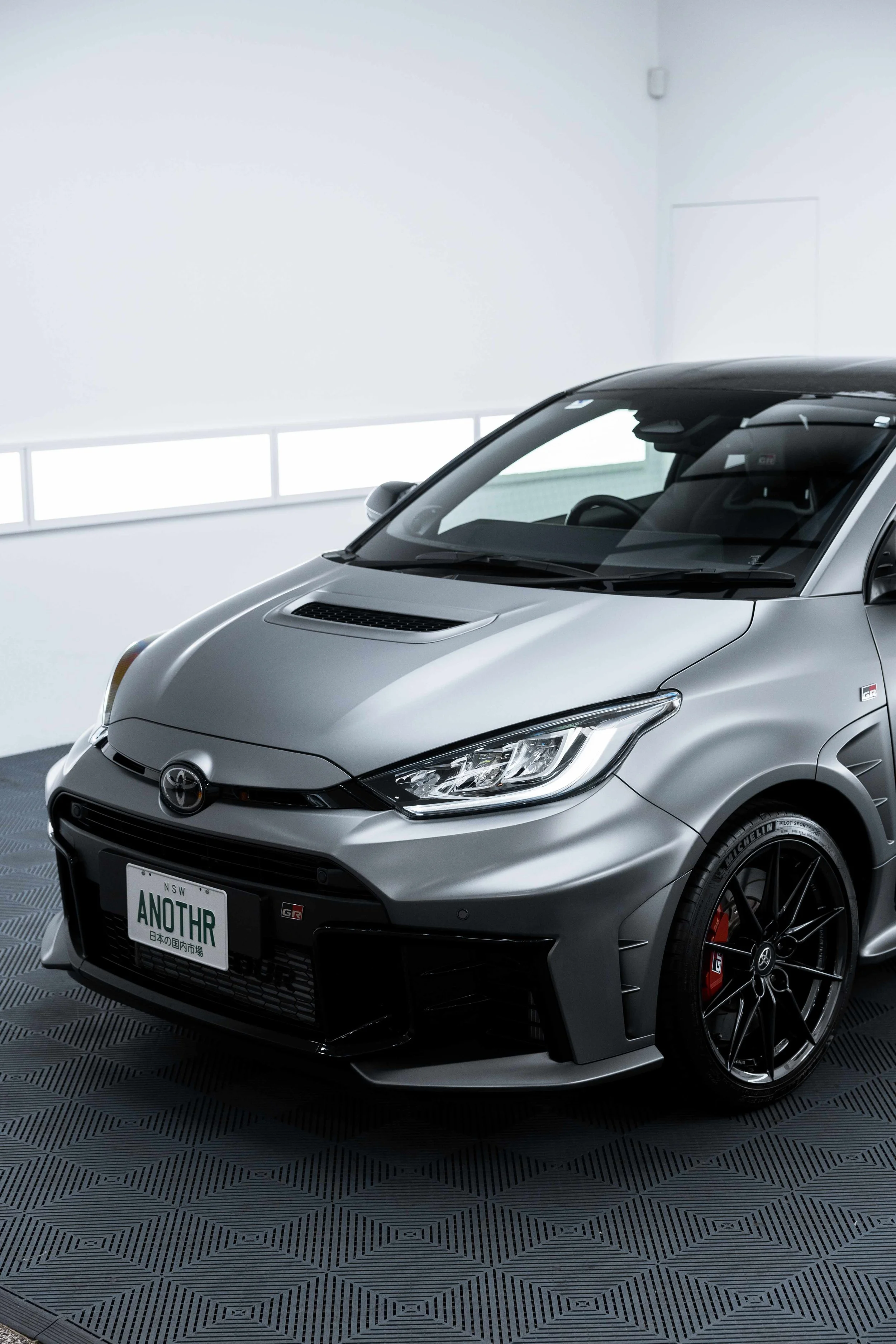 Matte grey Toyota GR Yaris front quarter with XPEL Paint Protection Film in Mona Vale