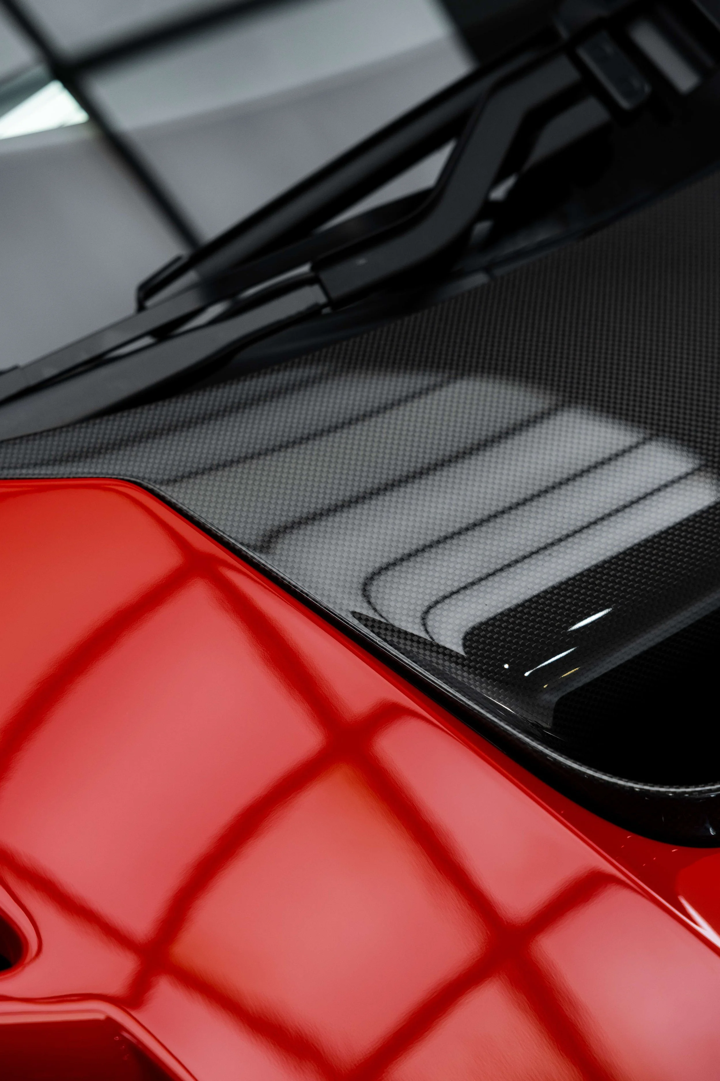 Red Ferrari 296 Speciale windscreen base and carbon cowl with wiper detail with XPEL Paint Protection Film in Mona Vale