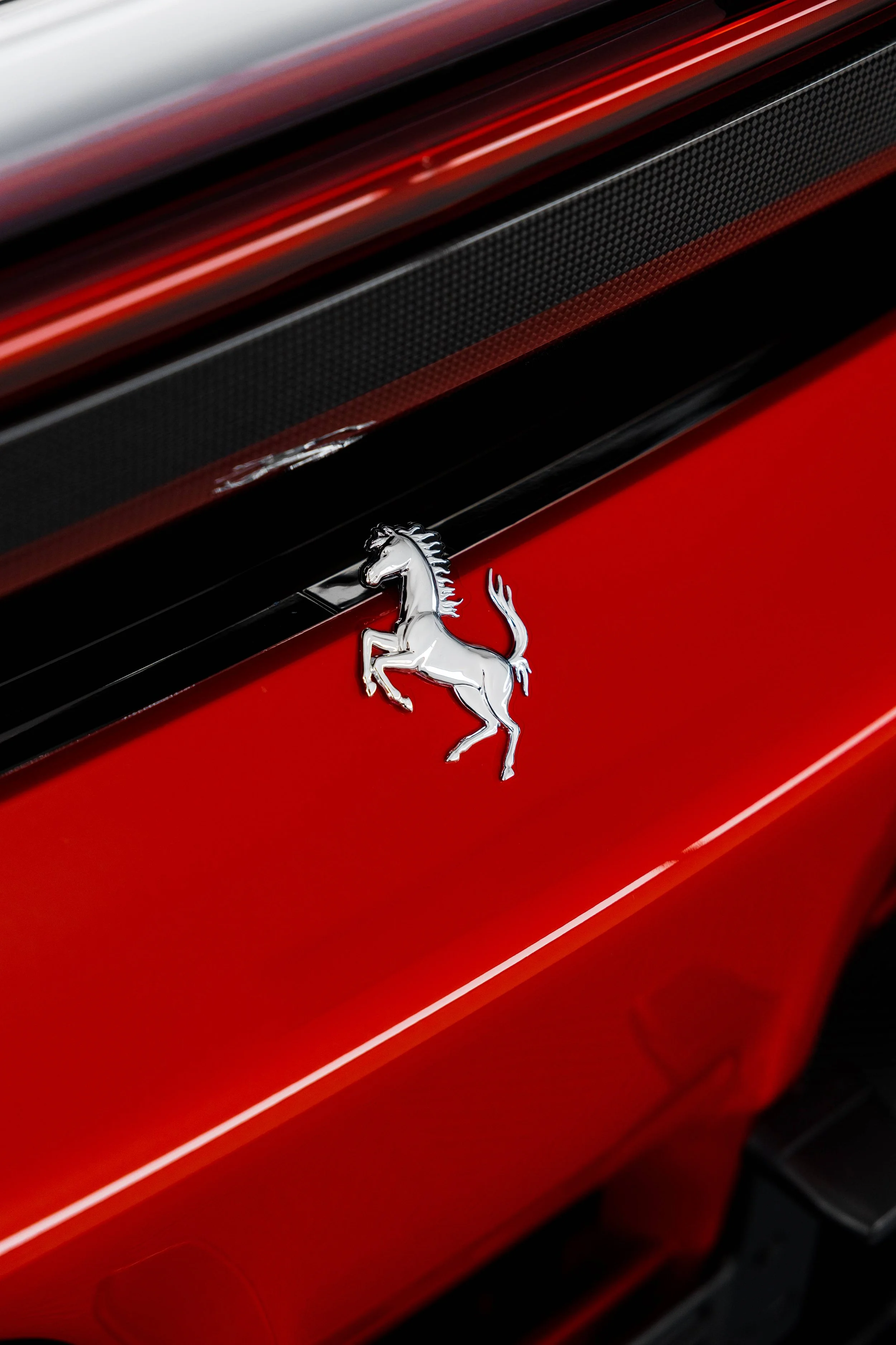 Red Ferrari SF90 Spyder rear Prancing Horse badge with XPEL Paint Protection Film in Sydney