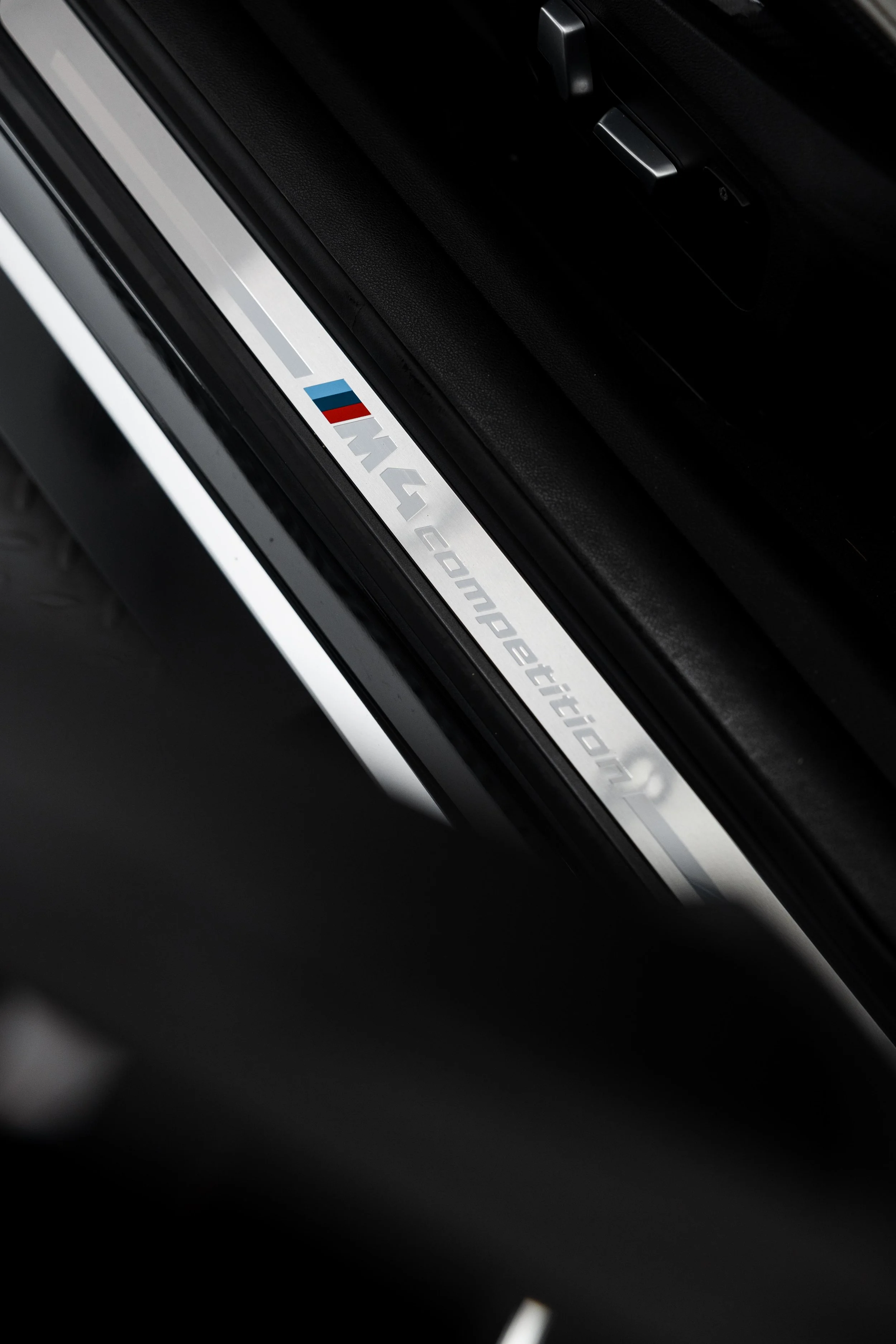 BMW M4 Competition door sill with XPEL Paint Protection Film in Sydney