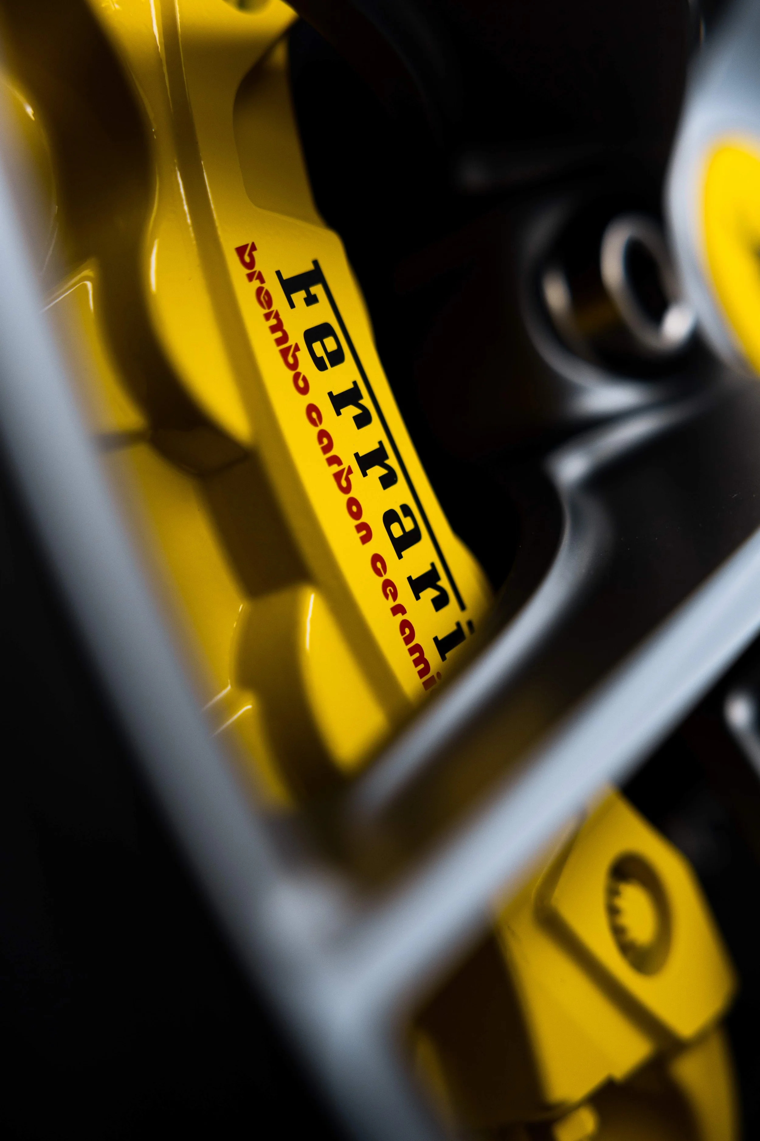 White Ferrari 812 GTS yellow brake caliper with XPEL Paint Protection Film in Mona Vale