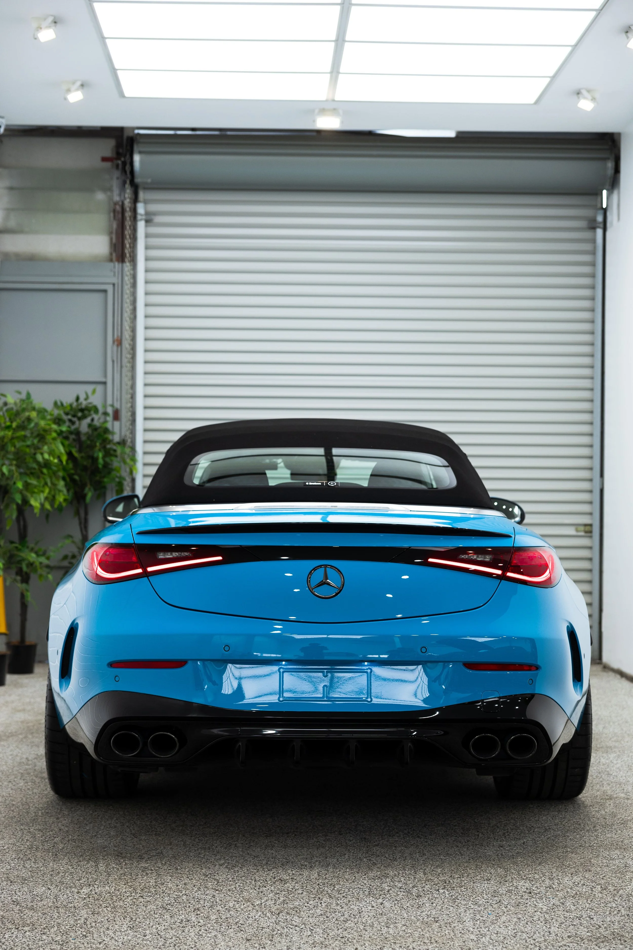 Rear view of blue Mercedes-AMG convertible with custom wrap and paint protection film by ADS in Mona Vale