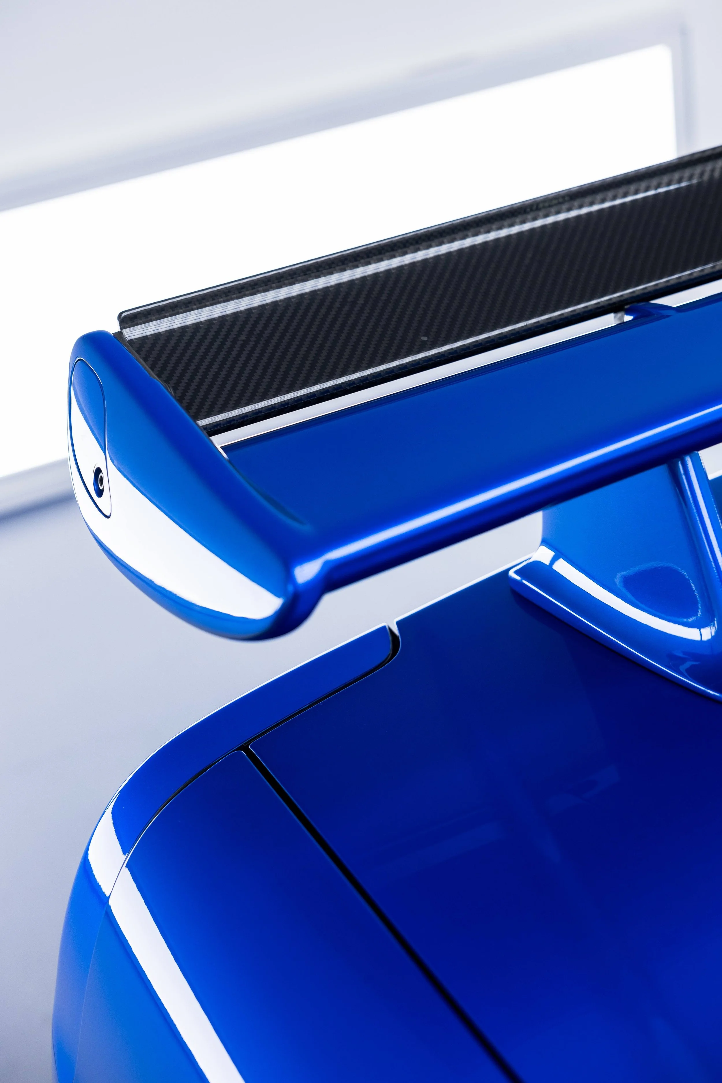 Bayside blue Nissan R34 GT-R Nur rear spoiler with XPEL Paint Protection Film in Sydney