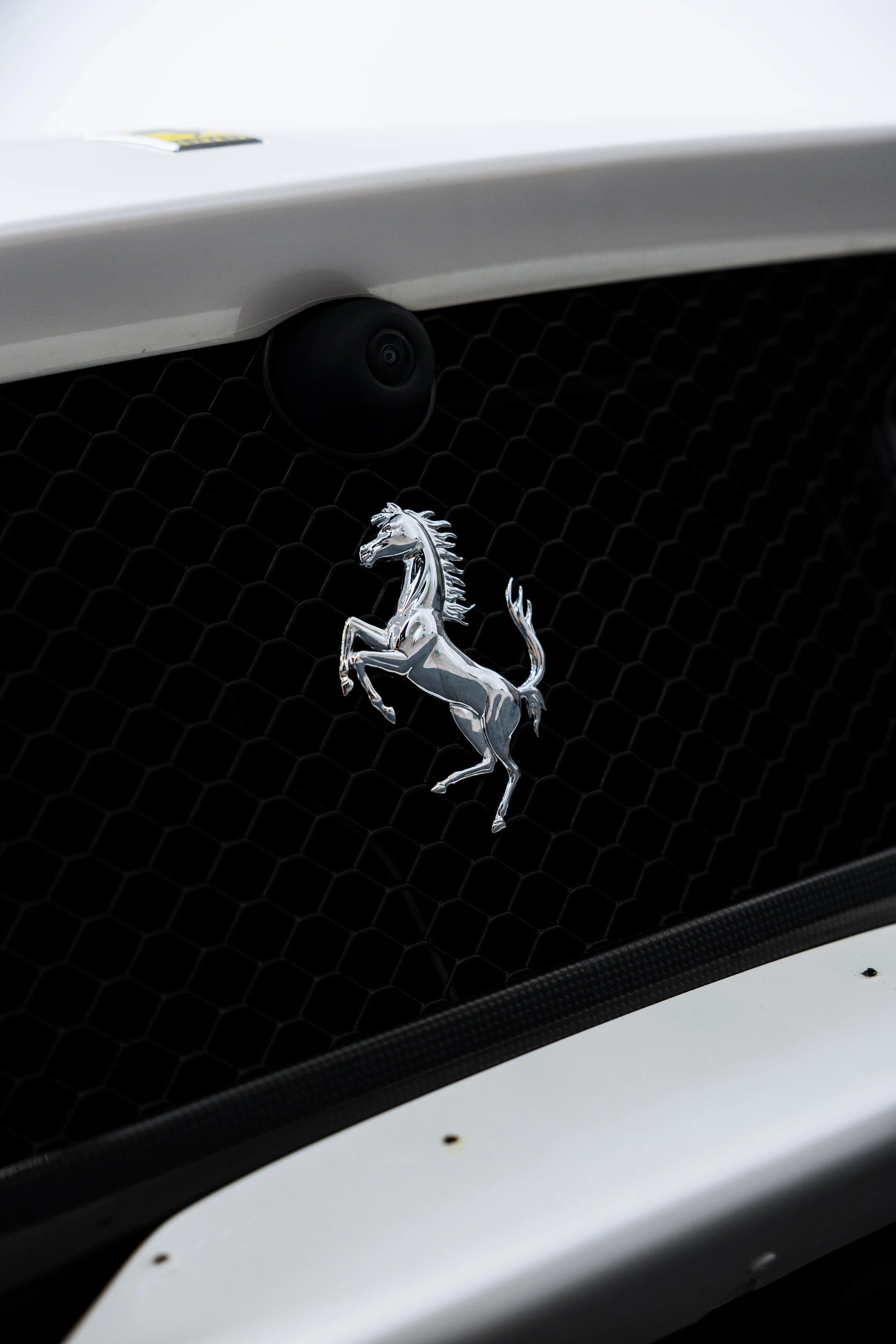 White Ferrari 812 GTS grille and Prancing Horse emblem with XPEL Paint Protection Film in Sydney