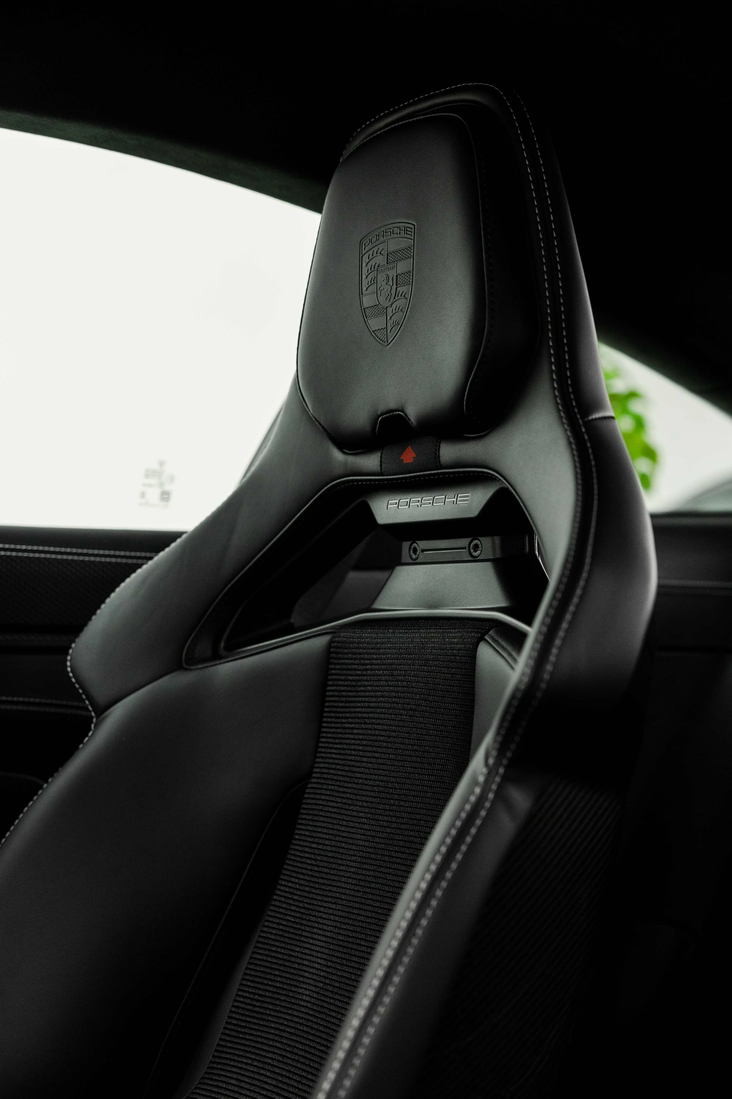 Cream Porsche 911 GT3 Touring interior detailing seat and Porsche crest headrest in Mona Vale
