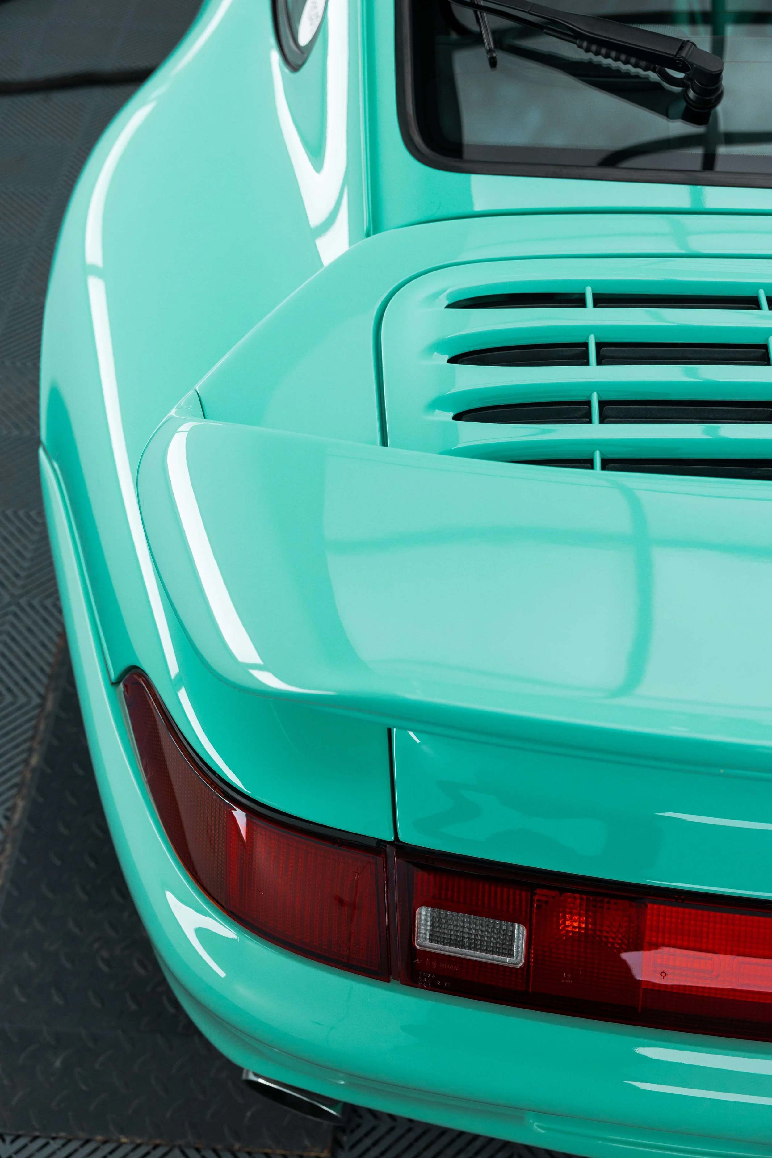 Mint green Porsche 993 rear quarter and tail light with XPEL Paint Protection Film in Mona Vale