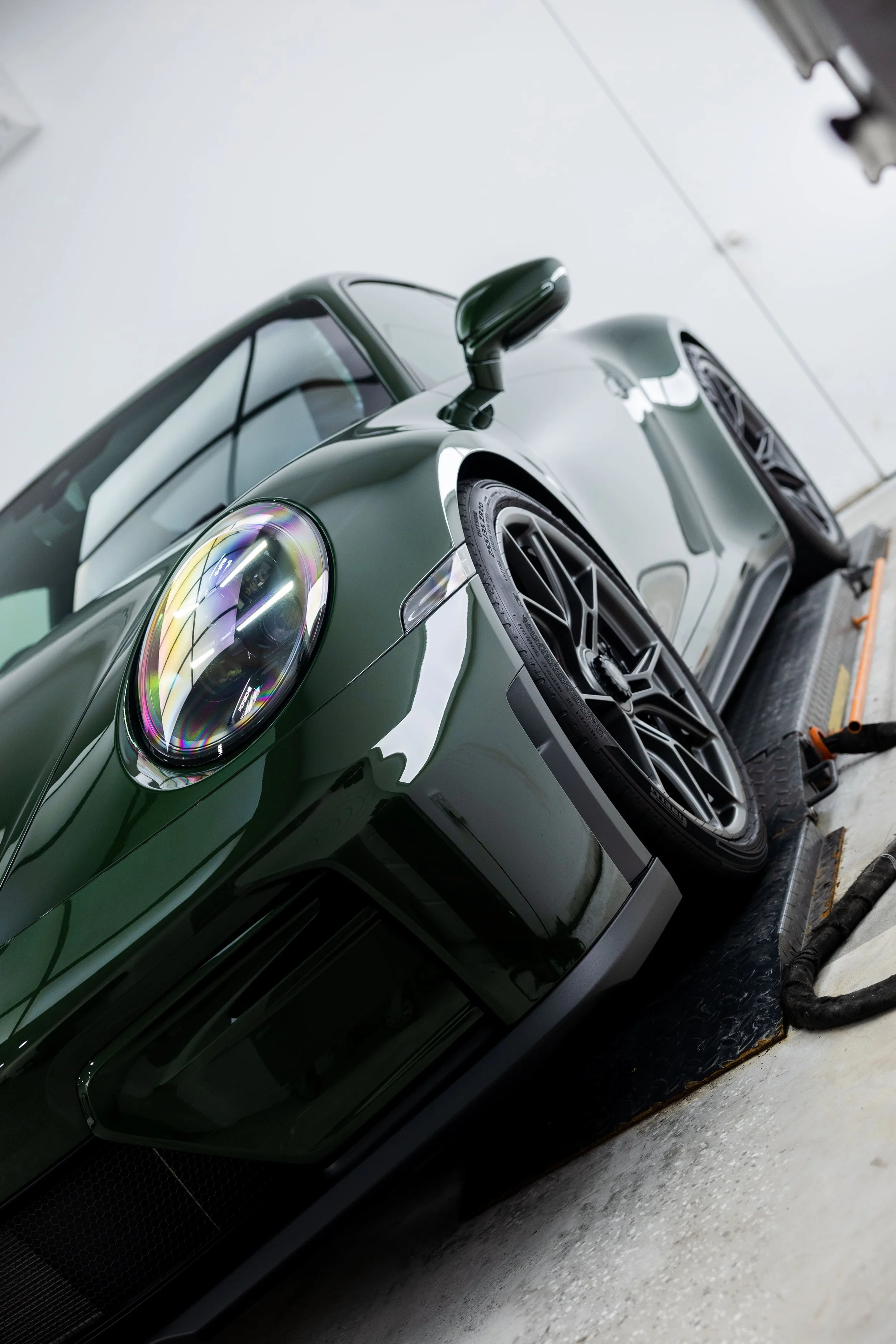 Green Porsche 911 GT3 Touring front quarter angle with full PPF by ADS in Mona Vale