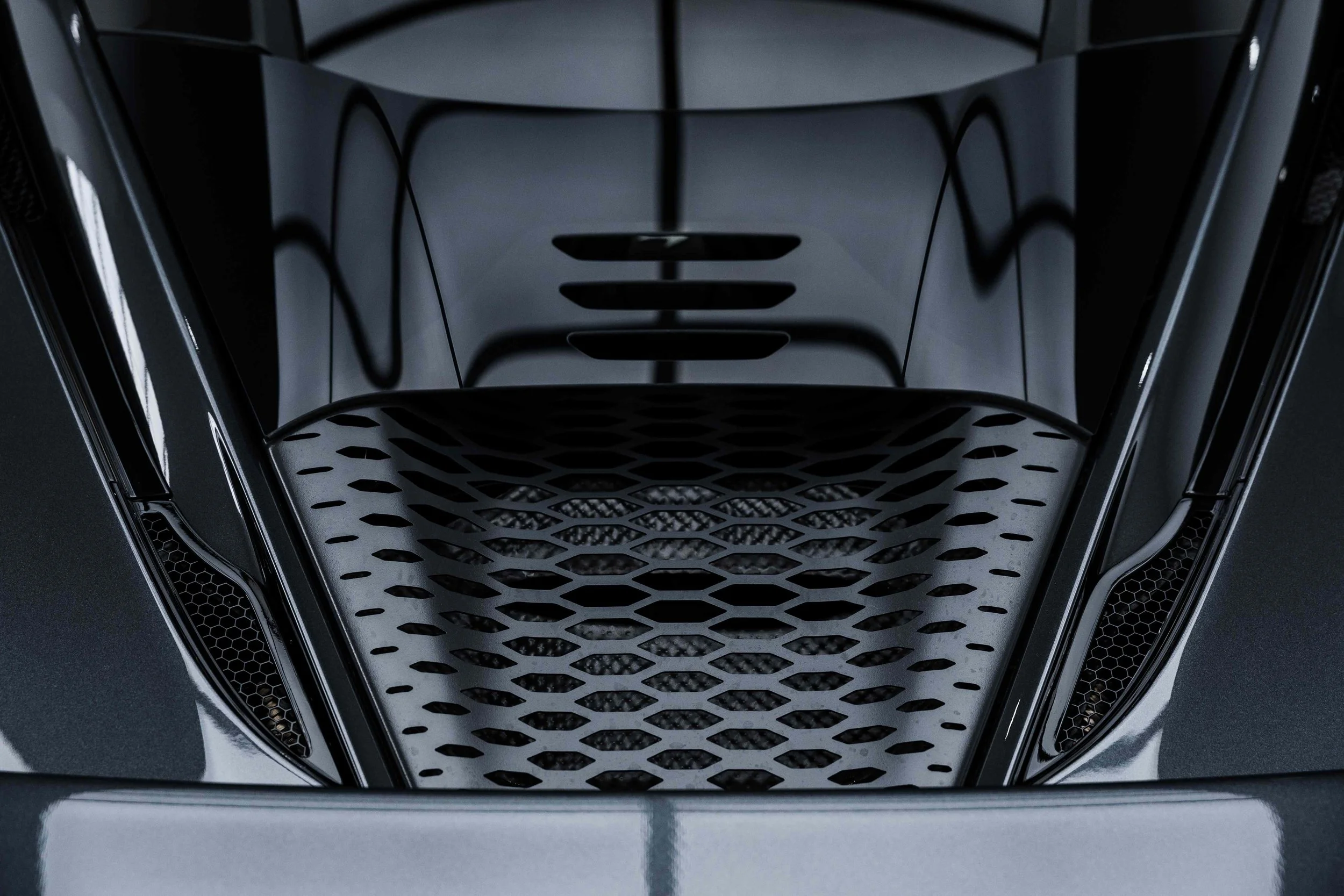 Black McLaren 750S engine bay vent detail with XPEL Paint Protection Film in Sydney