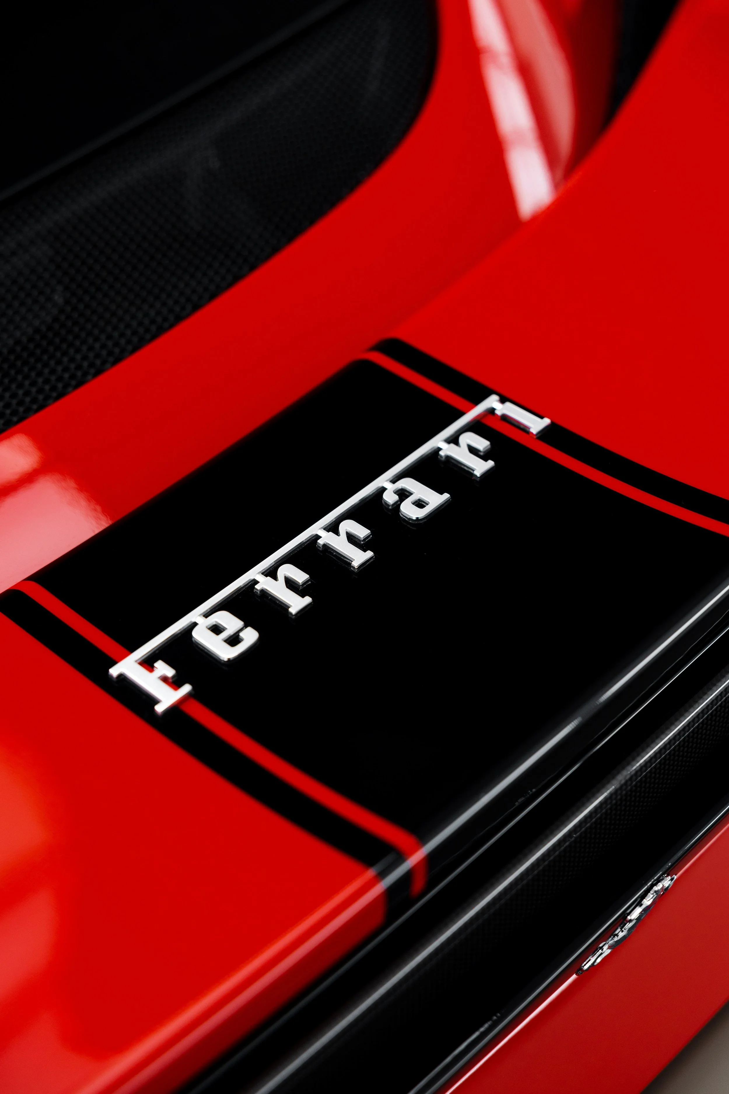 Red Ferrari 296 Speciale rear deck Ferrari script on black stripe with XPEL Paint Protection Film in Mona Vale