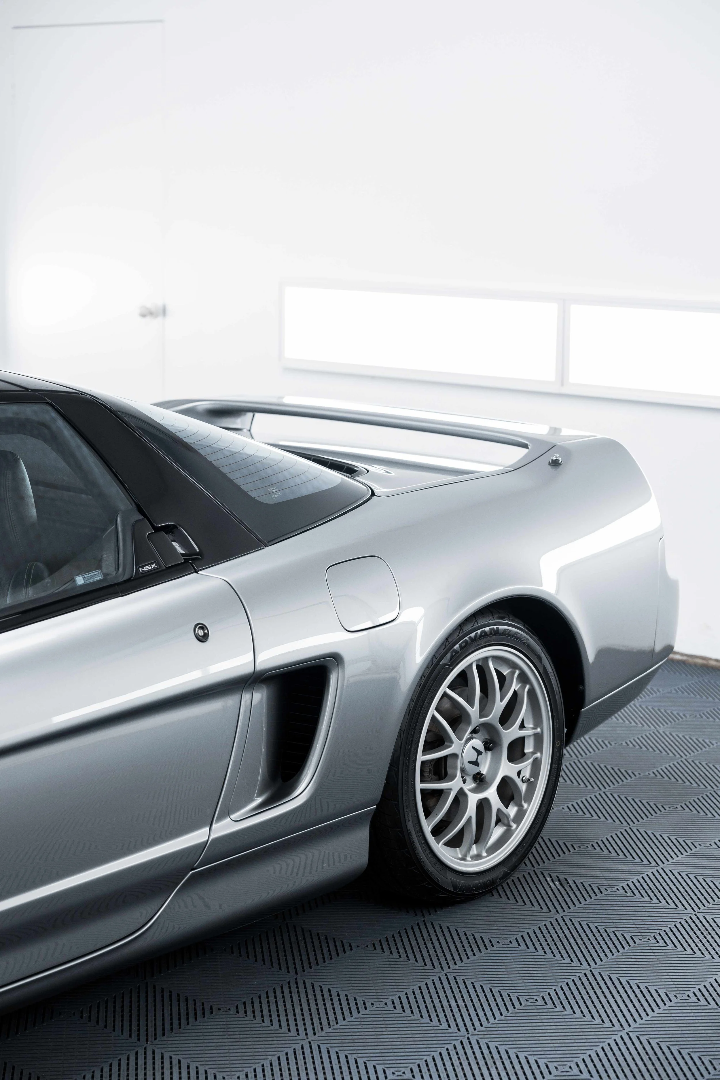 Silver Honda NSX rear quarter panel and wheel with XPEL Paint Protection Film in Sydney