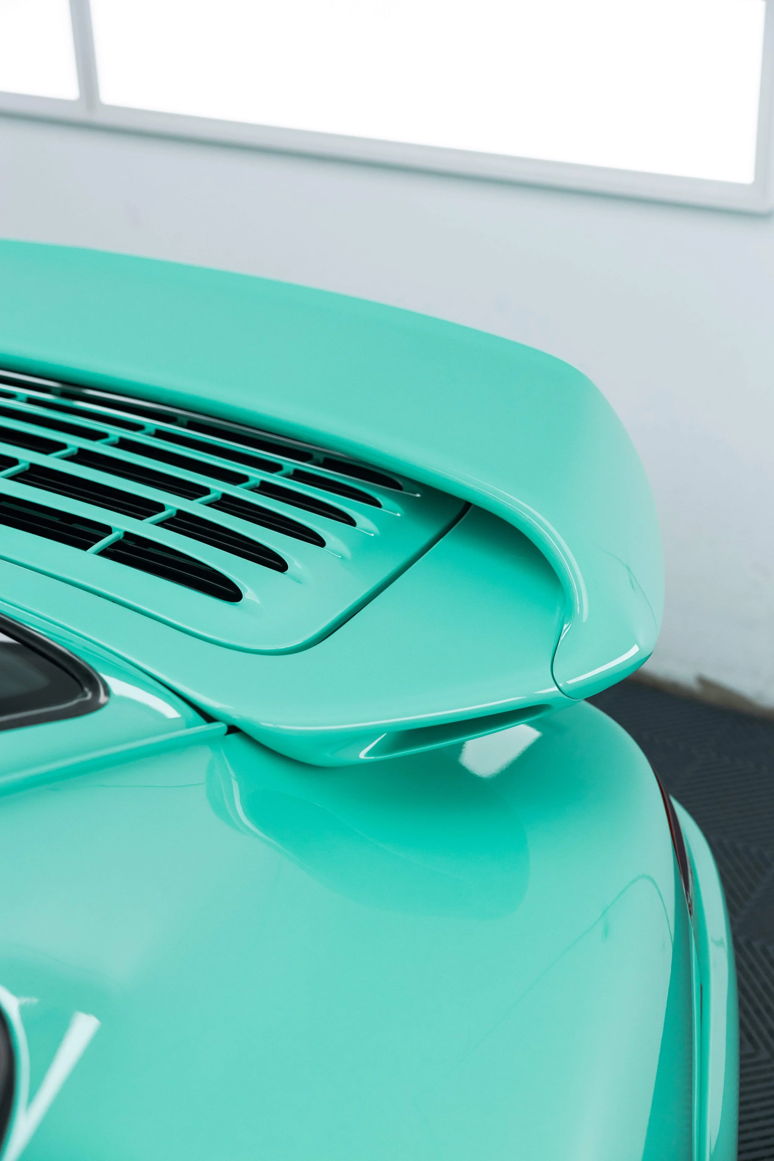 Mint green Porsche 993 rear wing and engine grille with XPEL Paint Protection Film in Sydney