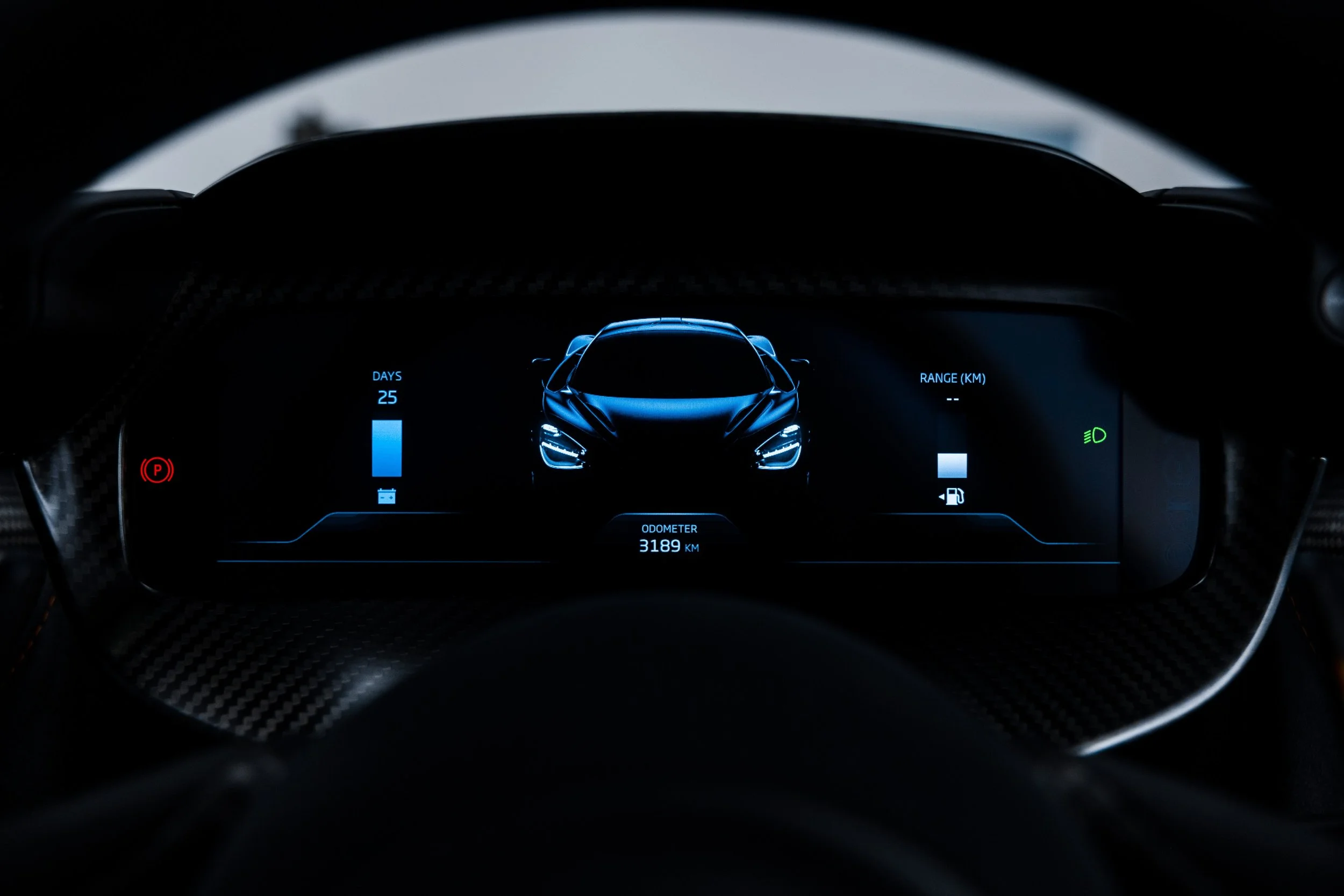 Black McLaren 750S interior detailing digital dashboard display in Mona Vale