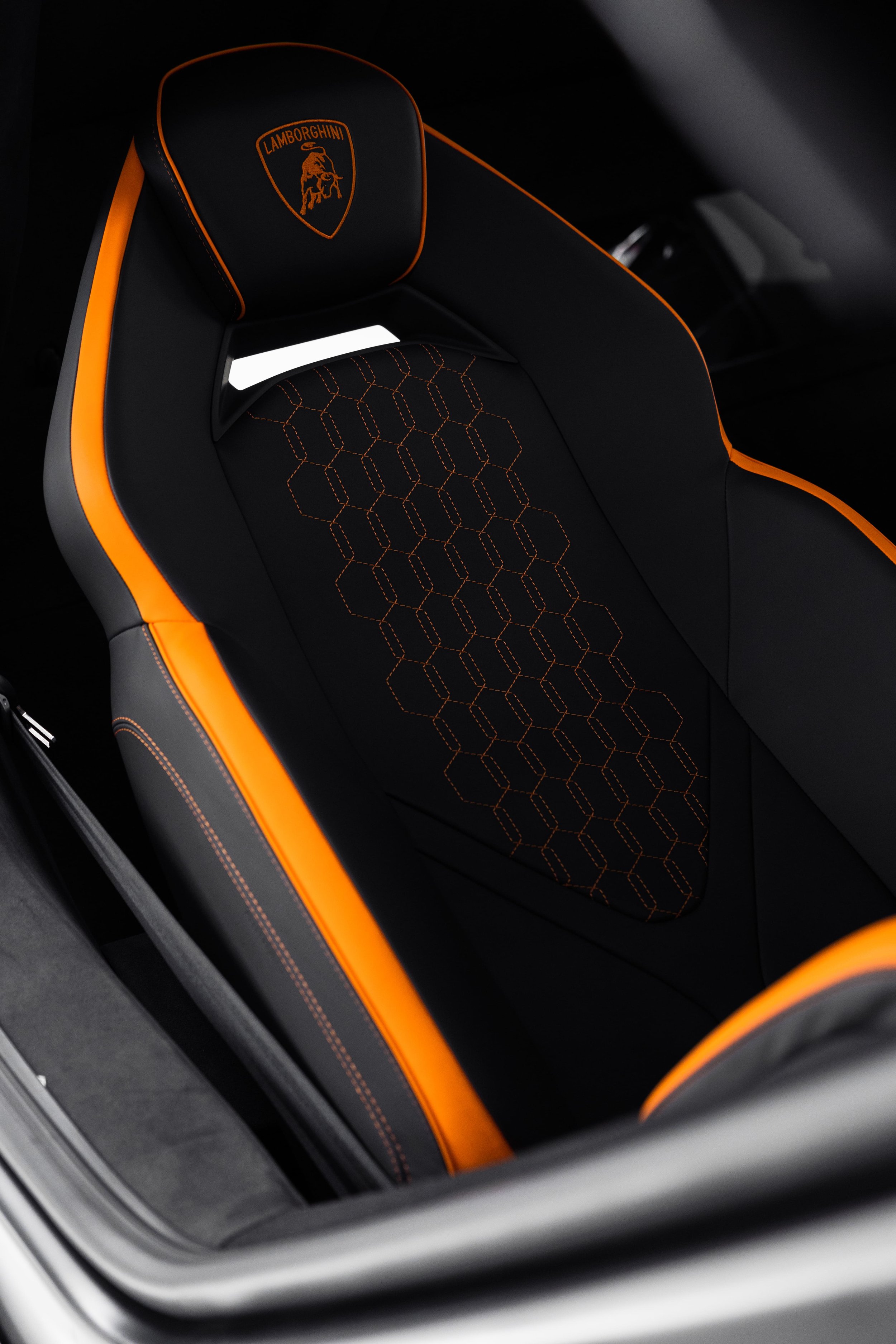 Lamborghini Revuelto sport seat with orange accents and premium interior detailing by ADS in Sydney