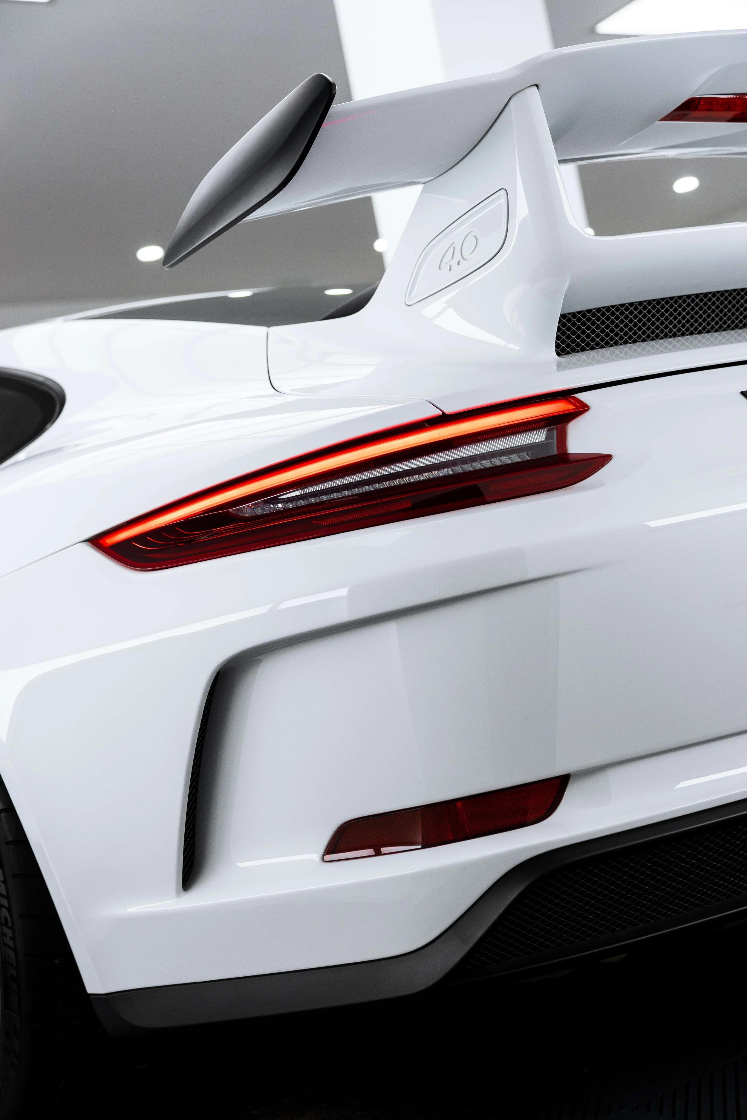 White Porsche GT3 rear wing and taillight with XPEL Paint Protection Film in Mona Vale