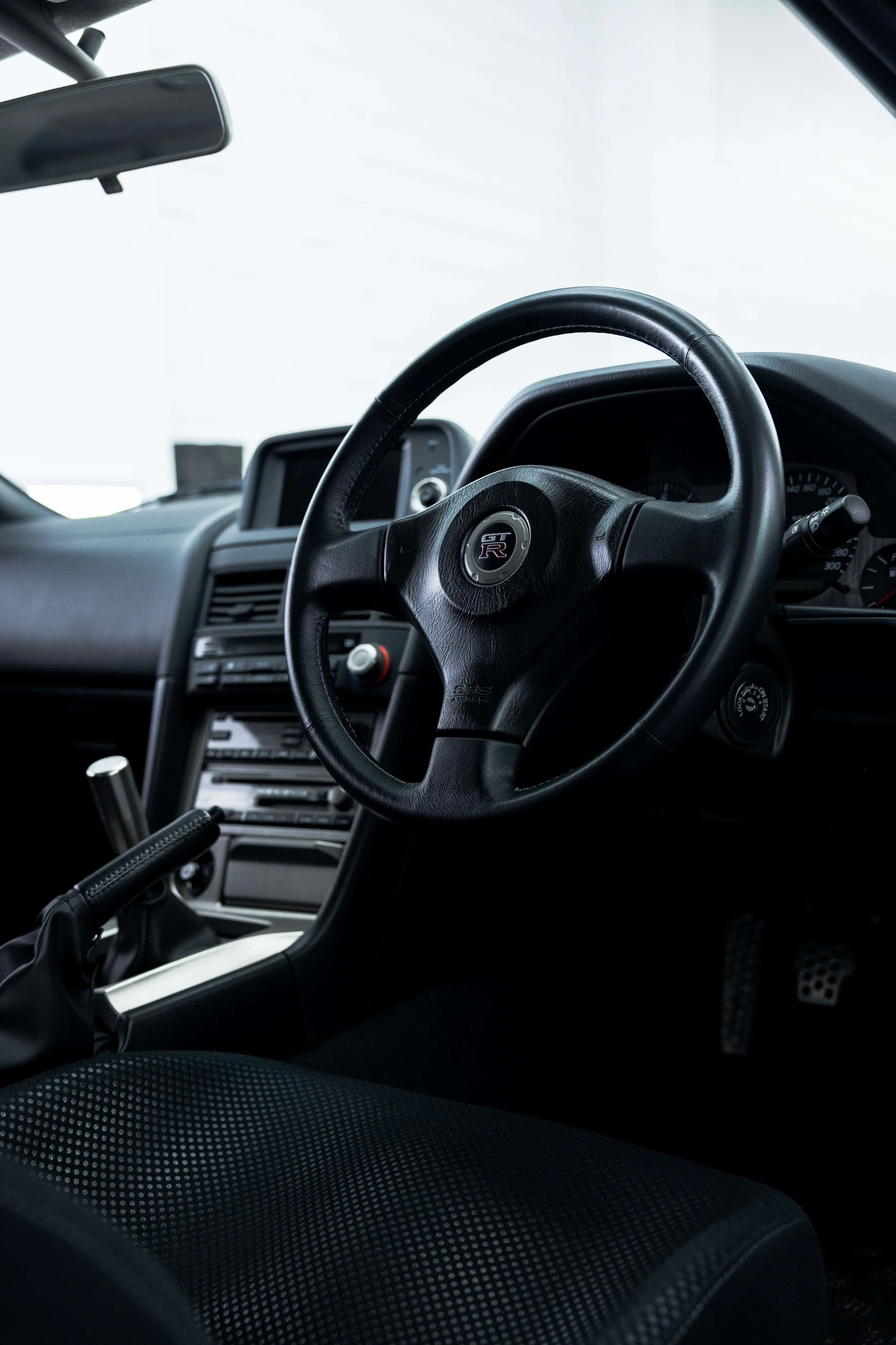 Nissan R34 GT-R steering wheel and dashboard after interior detailing in Mona Vale