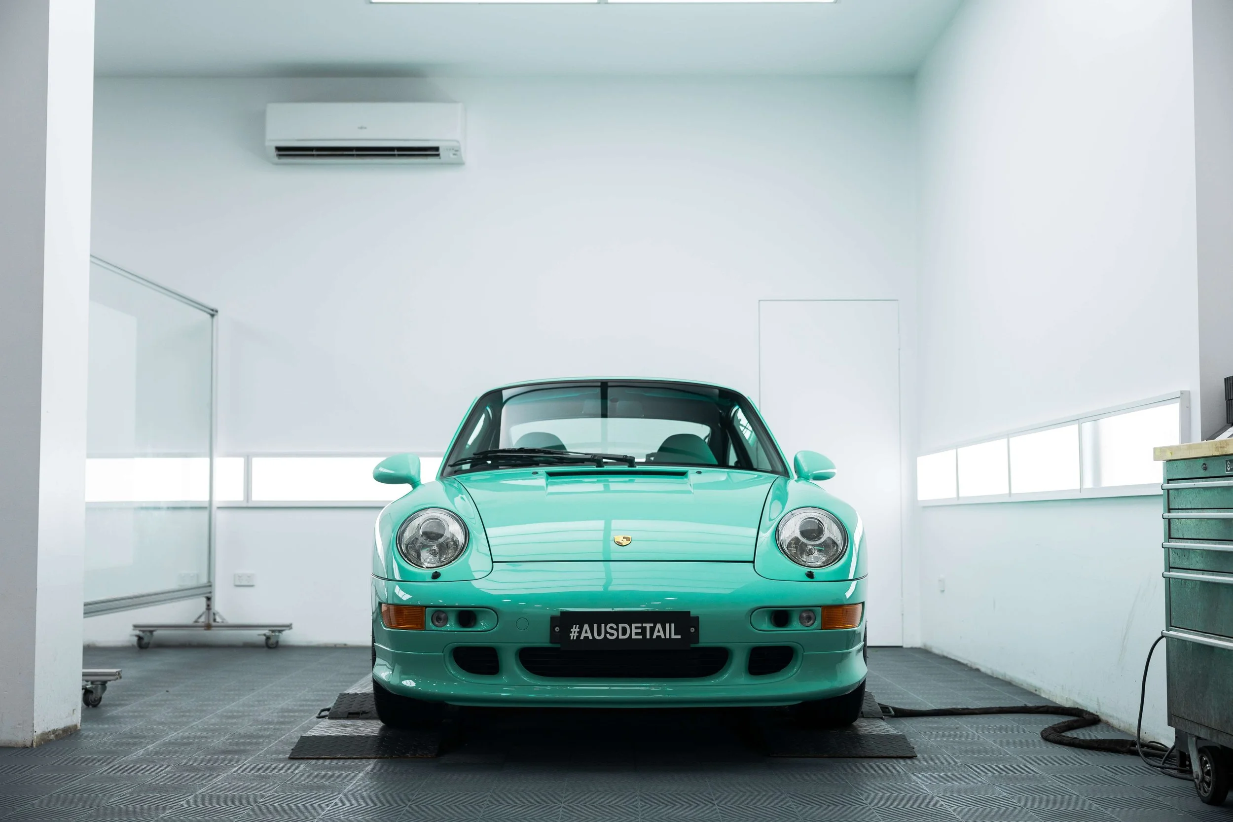 Mint green Porsche 993 front end with XPEL Paint Protection Film in Sydney