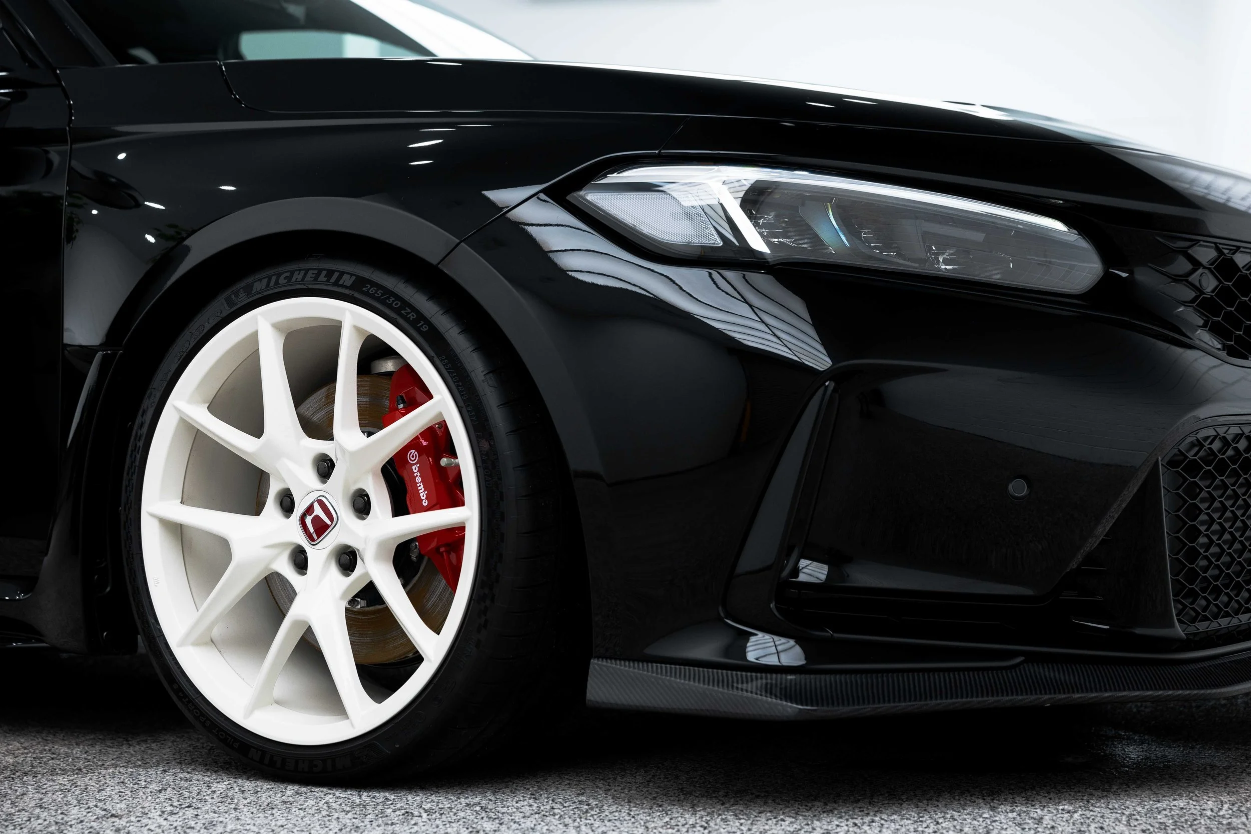 Black Honda Civic Type R front quarter and wheel with XPEL Paint Protection Film in Sydney