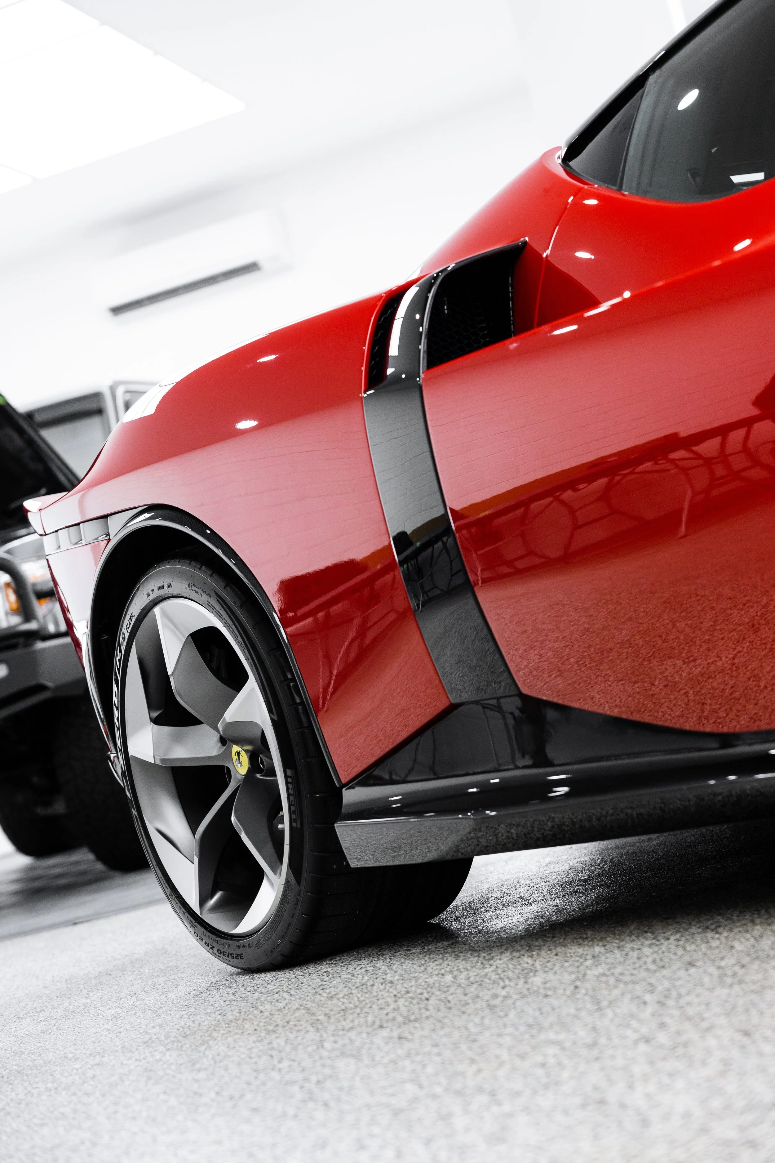 Red Ferrari 849 Testarossa side intake and wheel with XPEL Paint Protection Film in Sydney