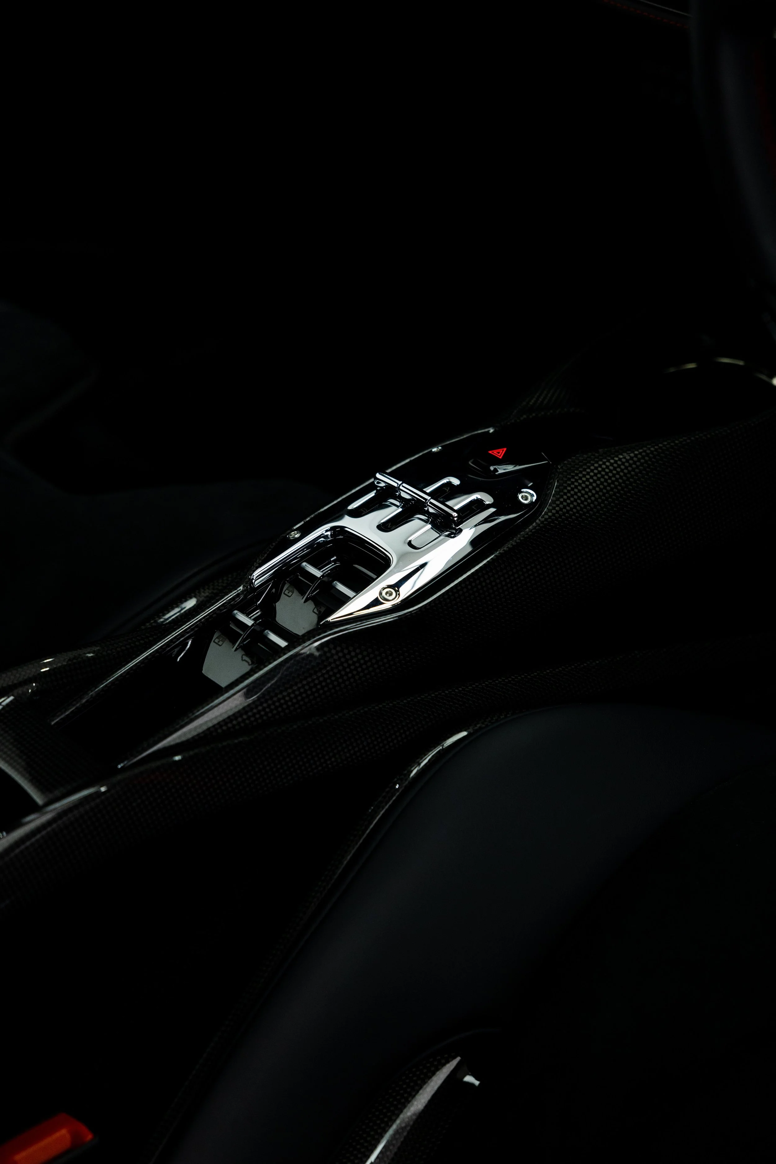 Red Ferrari SF90 Spyder interior detailing gear selector and carbon console in Mona Vale