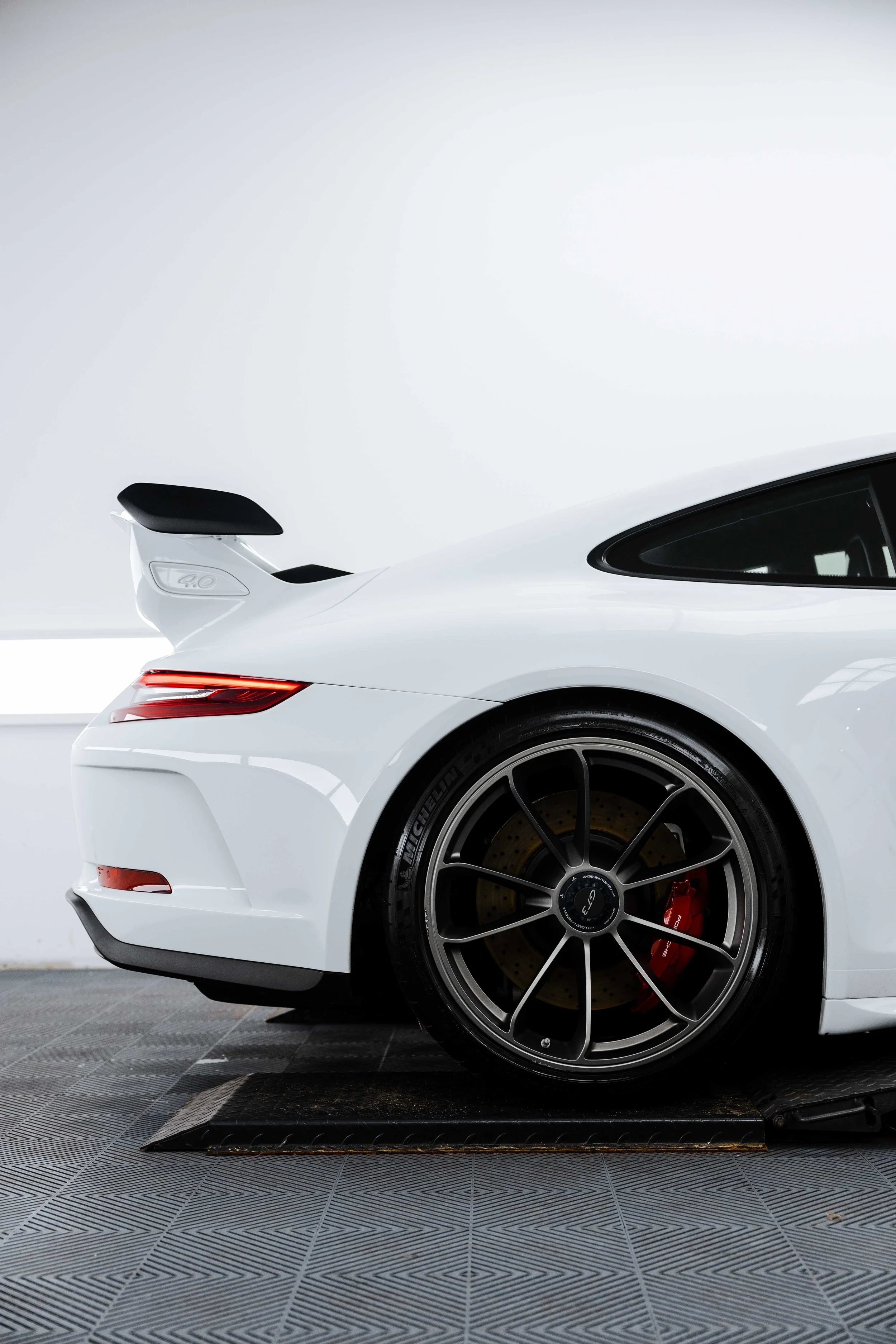 White Porsche GT3 rear wing and wheel with XPEL Paint Protection Film in Mona Vale