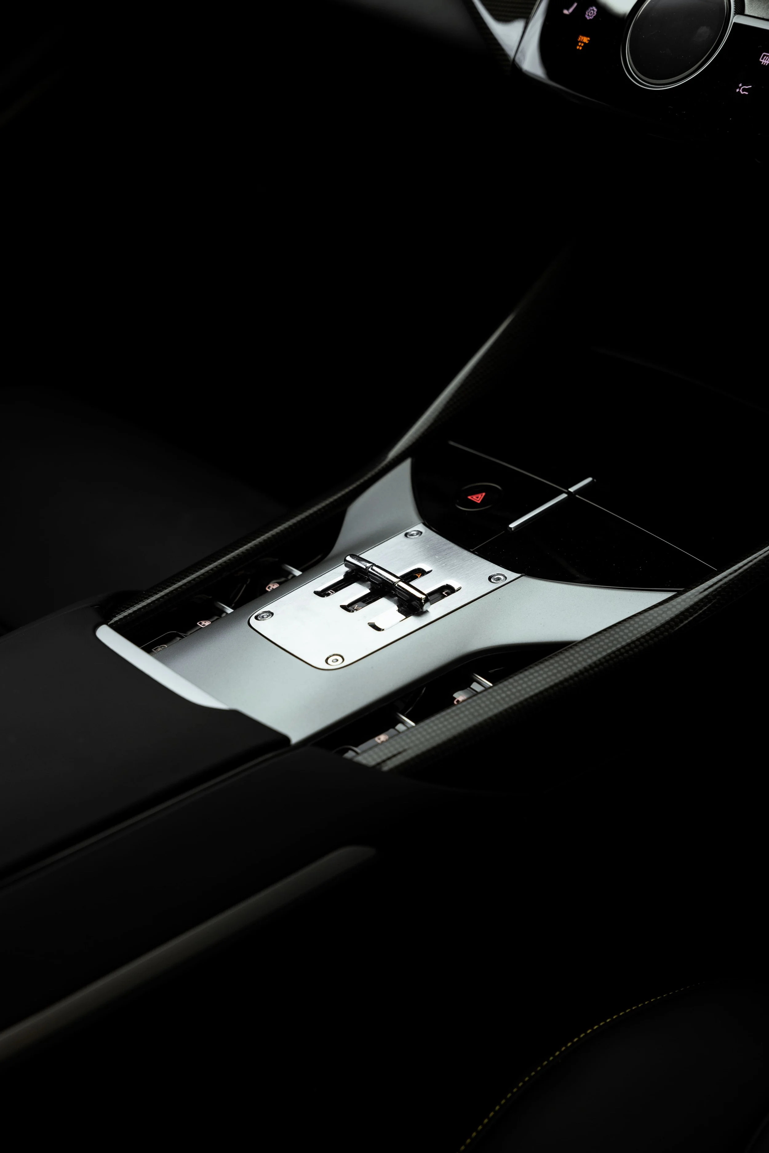 Ferrari Purosangue centre console detail with metal gear selector and premium interior finish, protected by Australian Detailing Services Sydney