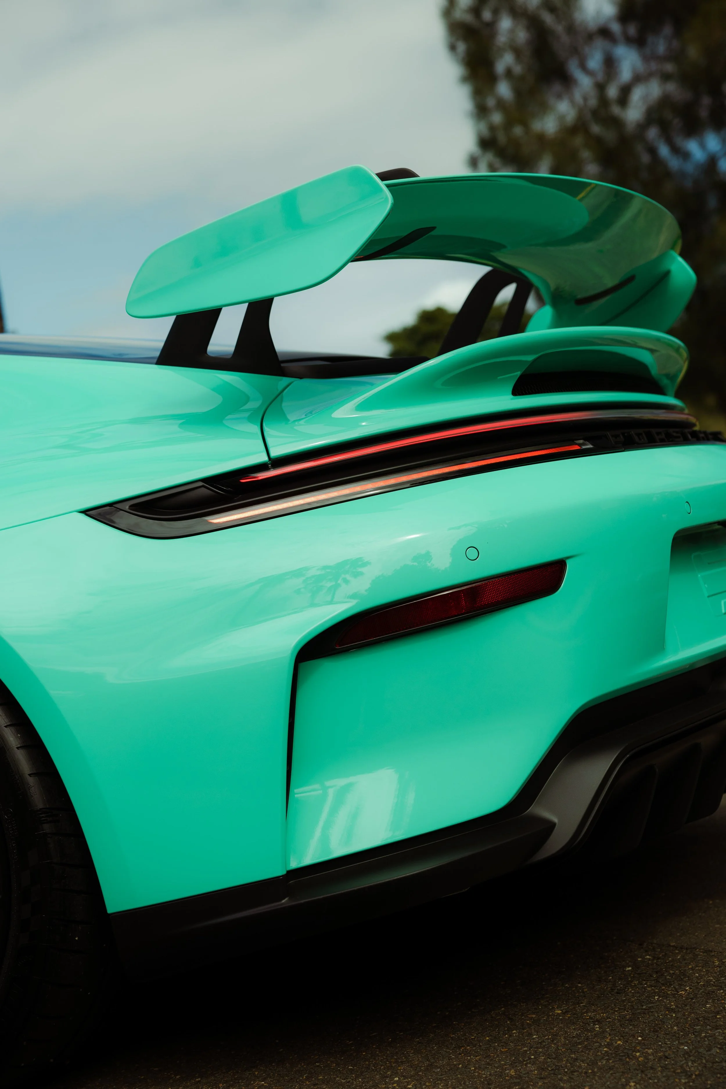 Mint green Porsche 911 GT3 rear wing and taillight with XPEL Paint Protection Film in Sydney