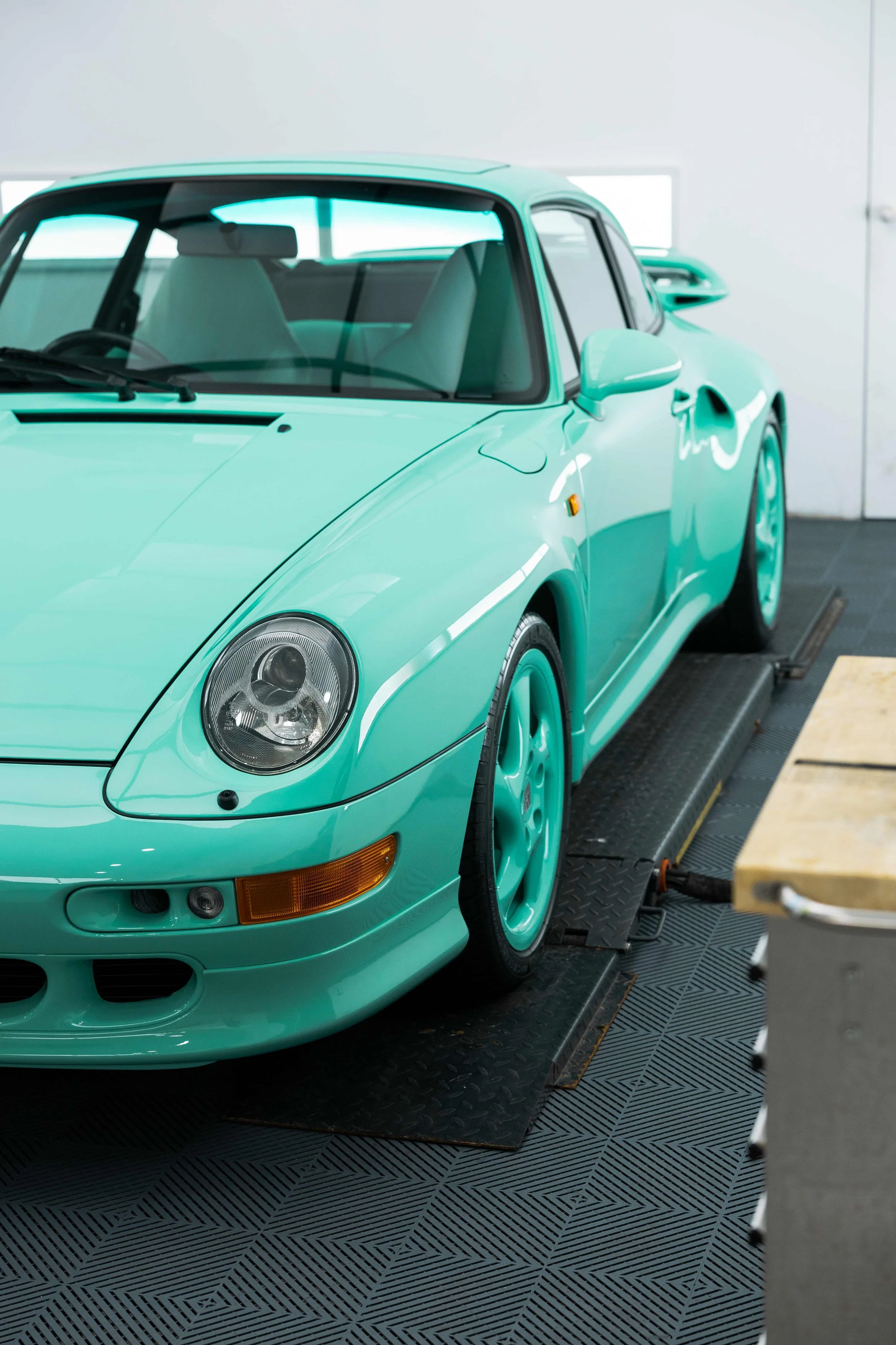 Mint green Porsche 993 front quarter with XPEL Paint Protection Film in Mona Vale