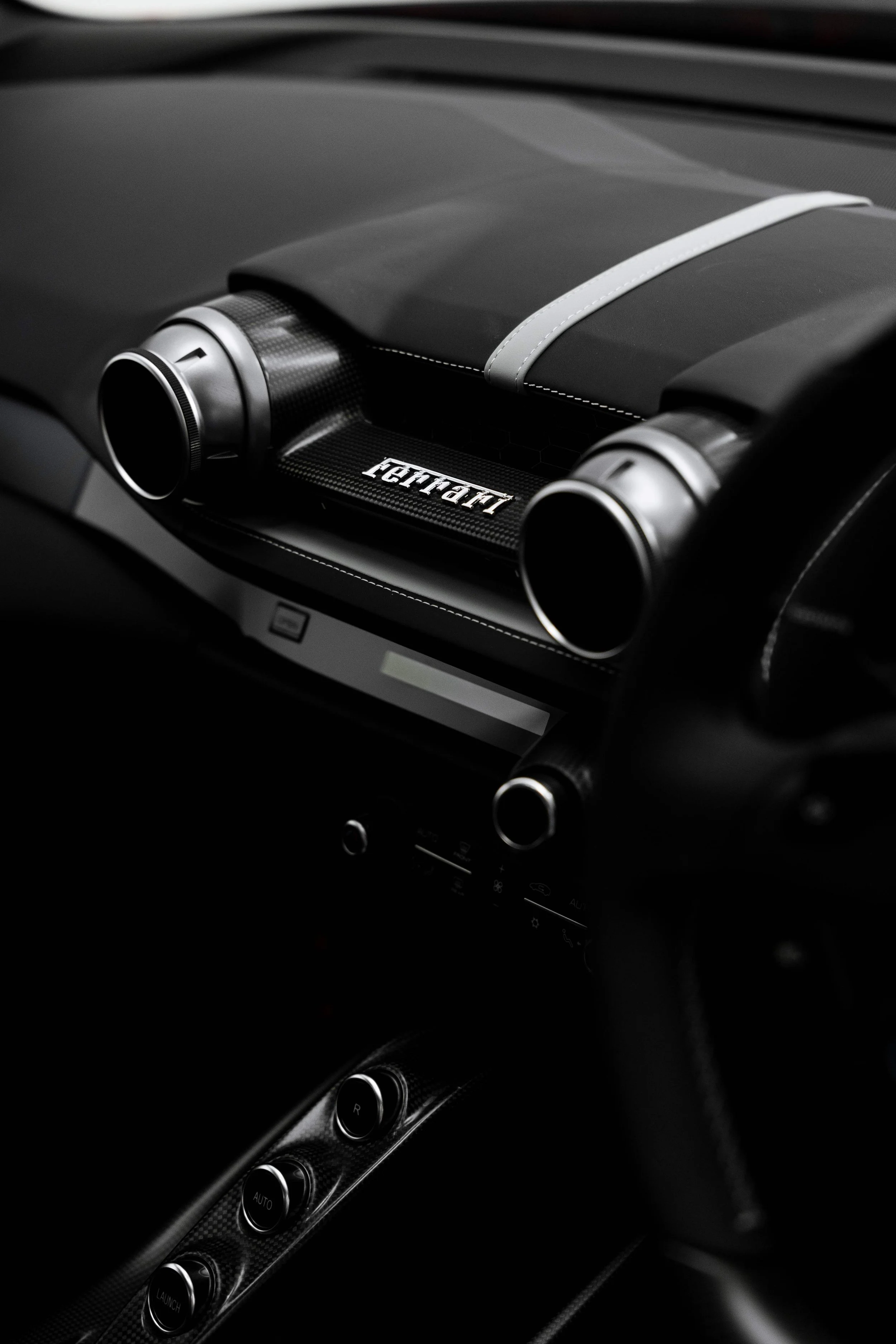 Red Ferrari 812 GTS interior detailing dash vent and Ferrari script in Sydney