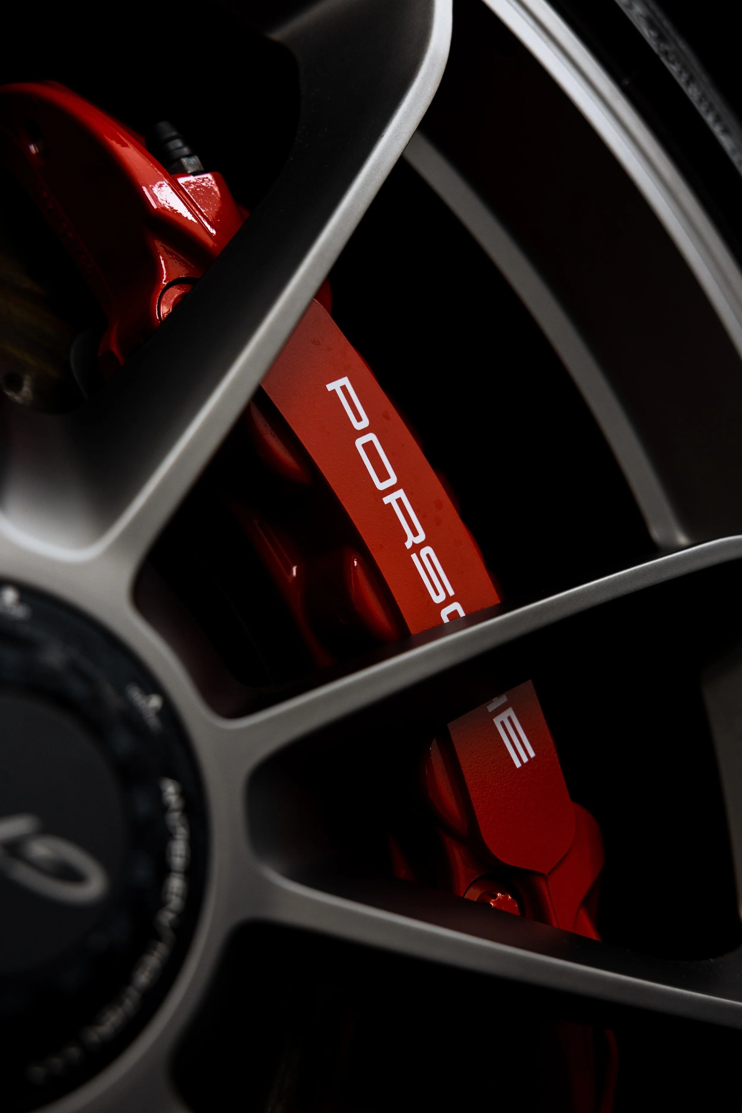White Porsche GT3 red brake caliper and wheel detail with XPEL Paint Protection Film in Mona Vale