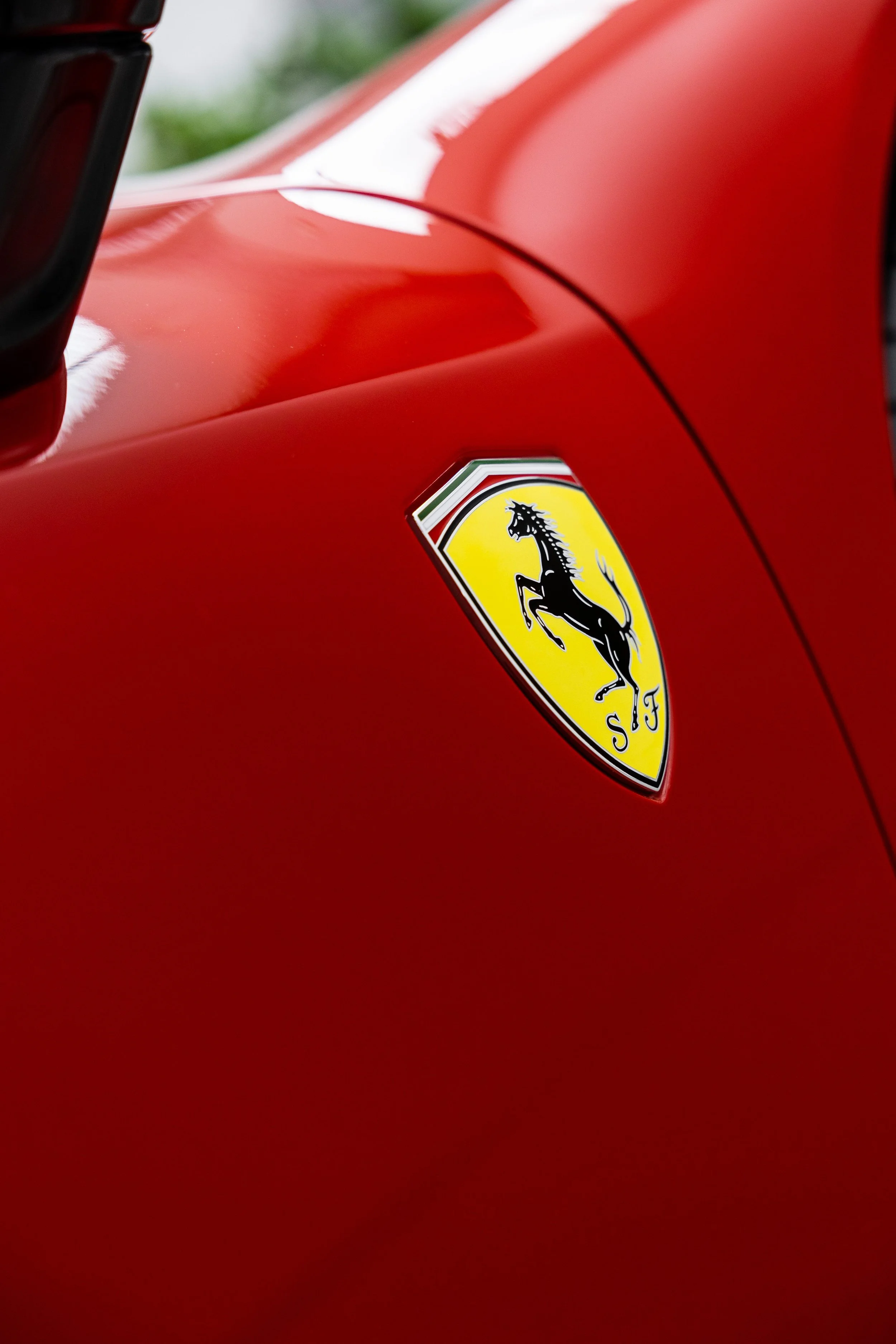 Ferrari badge on red 849 Testarossa bonnet with XPEL Paint Protection Film in Sydney