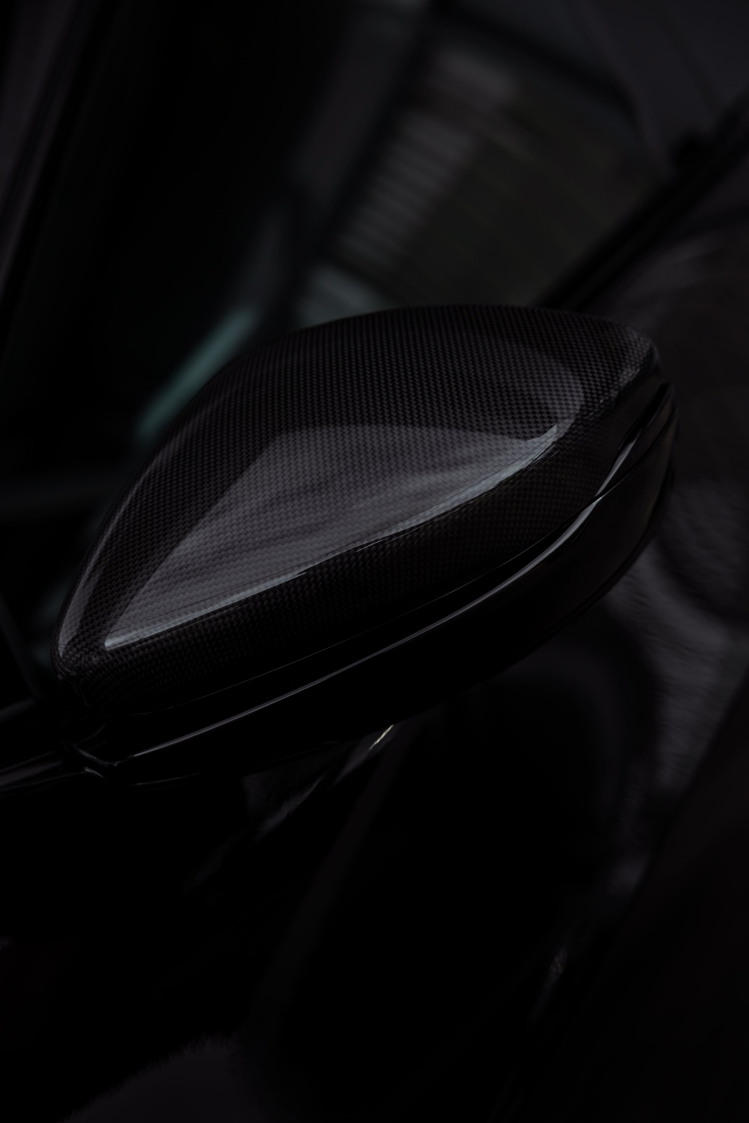 Ferrari Purosangue carbon fibre side mirror detail with PPF protection by Australian Detailing Services Sydney