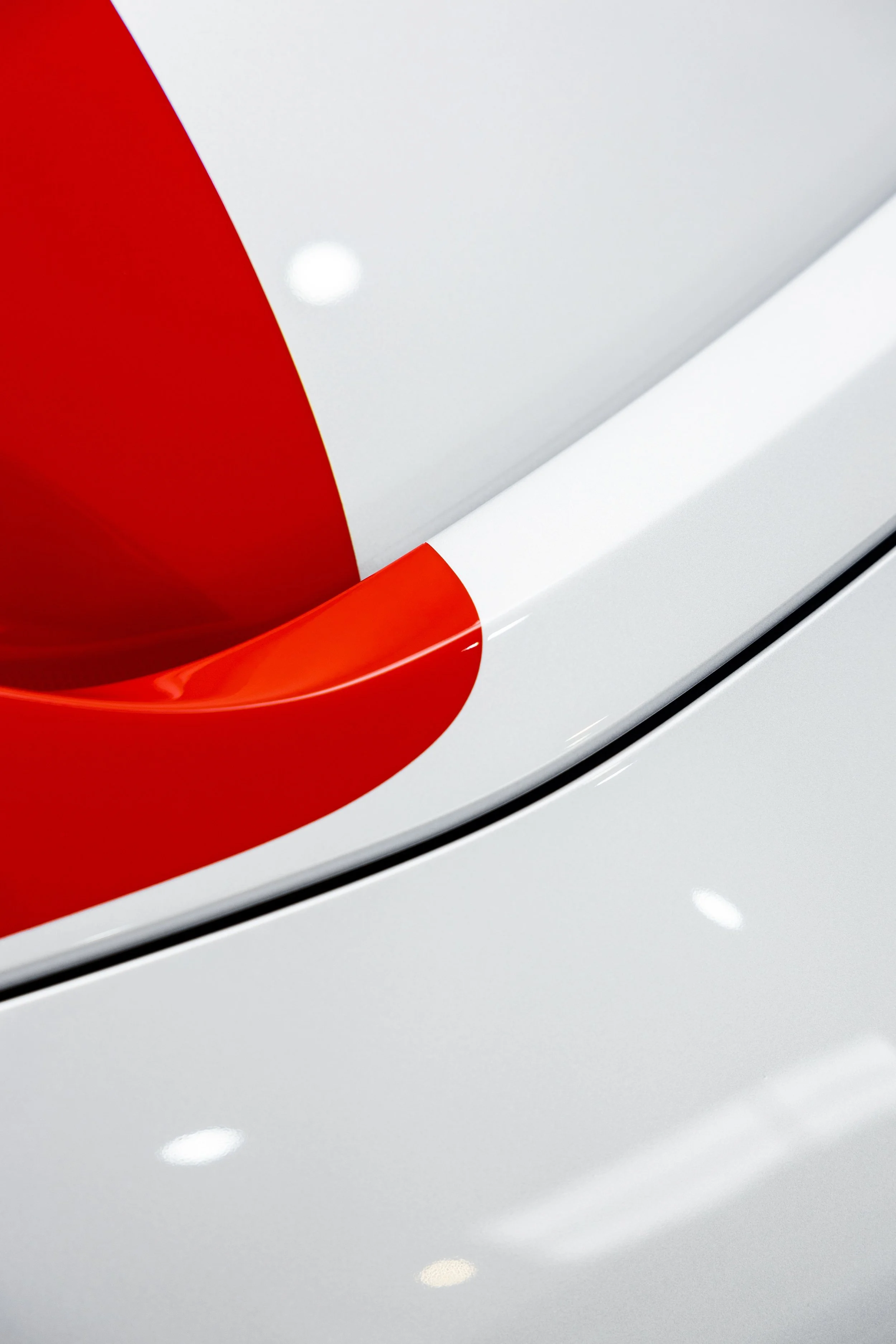 Red Ferrari SF90 Spyder bonnet with white stripe and XPEL Paint Protection Film in Mona Vale