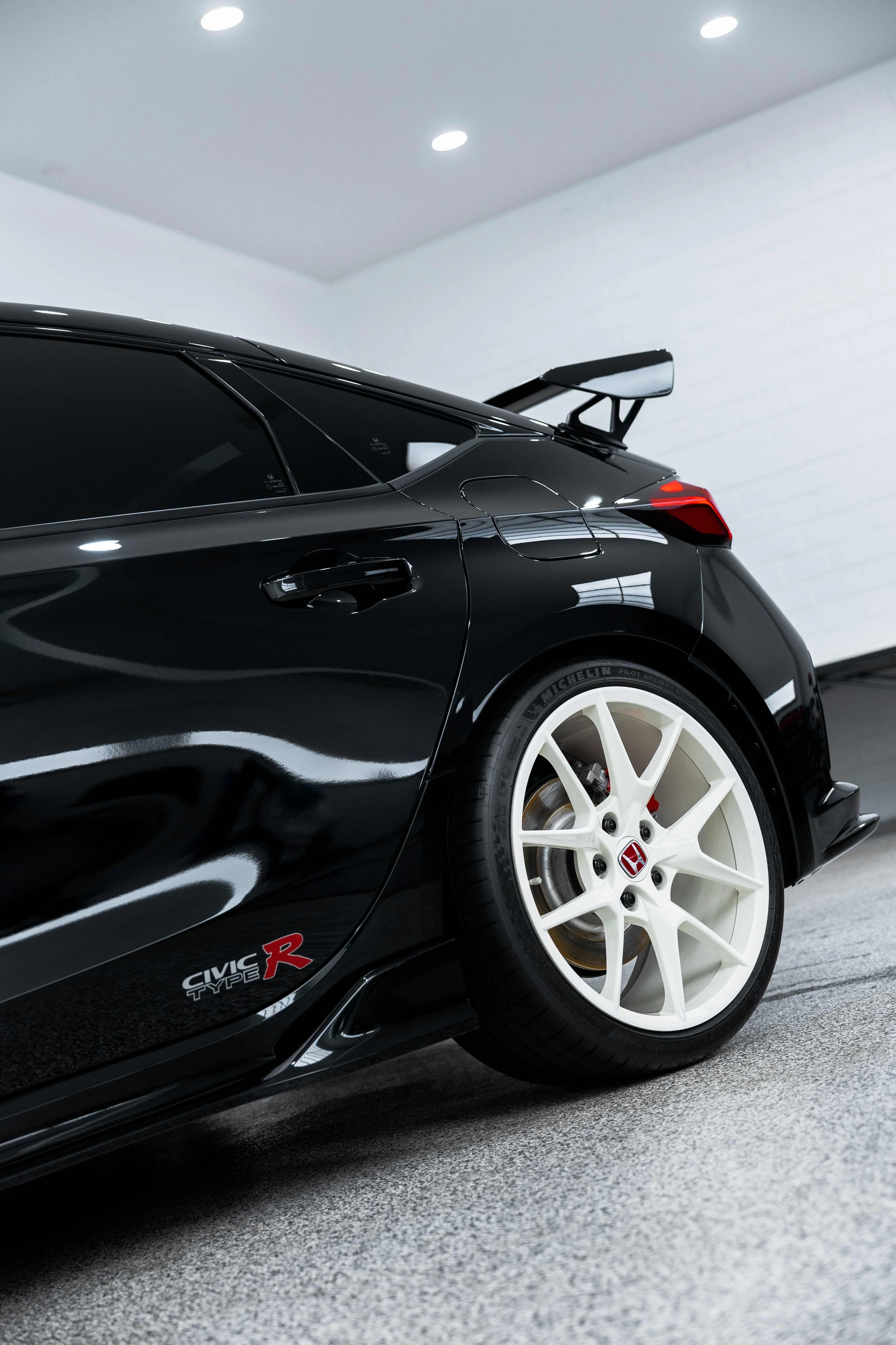 Black Honda Civic Type R rear quarter and wheel with XPEL Paint Protection Film in Sydney
