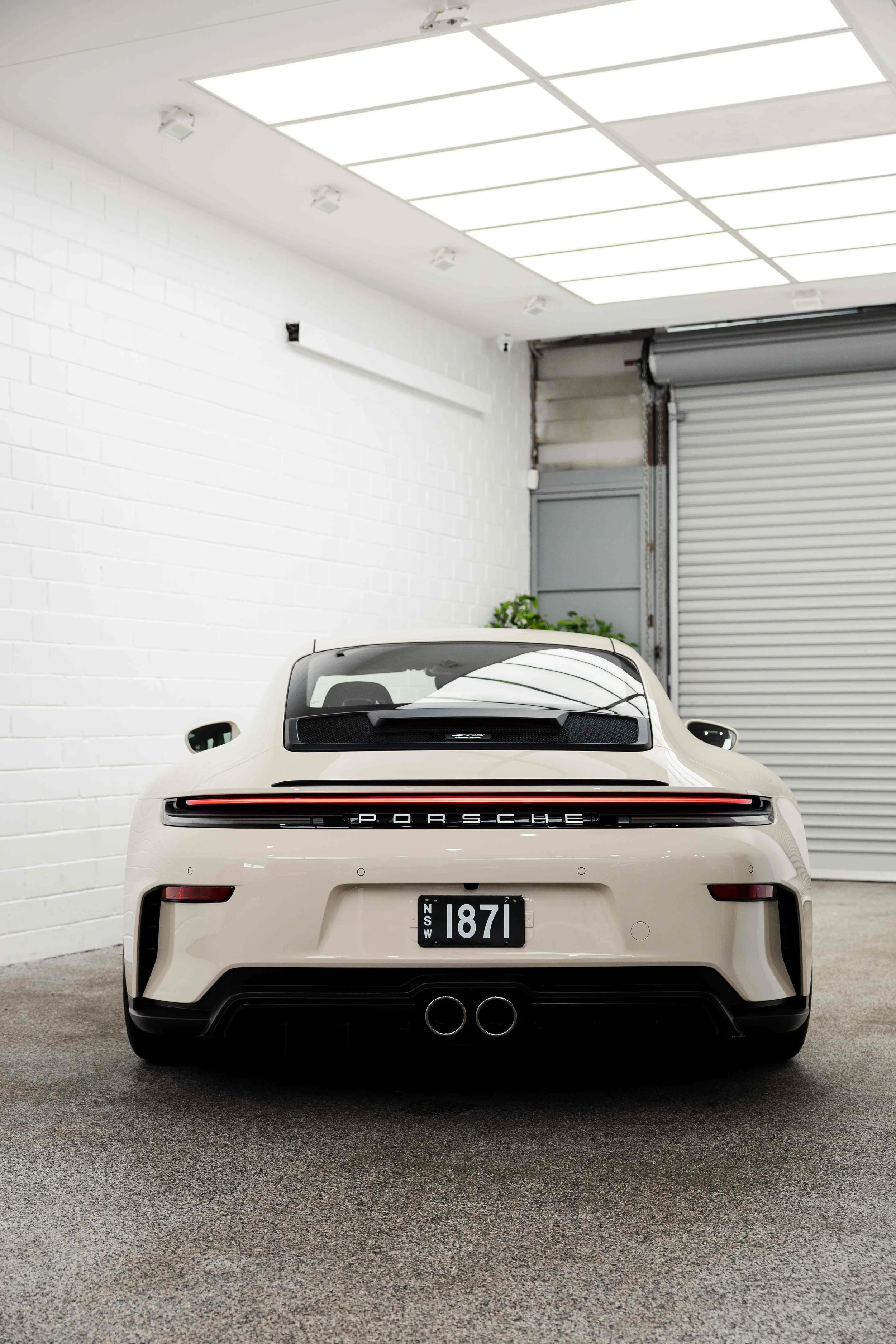 Cream Porsche 911 GT3 Touring rear view with Porsche script and XPEL Paint Protection Film in Sydney