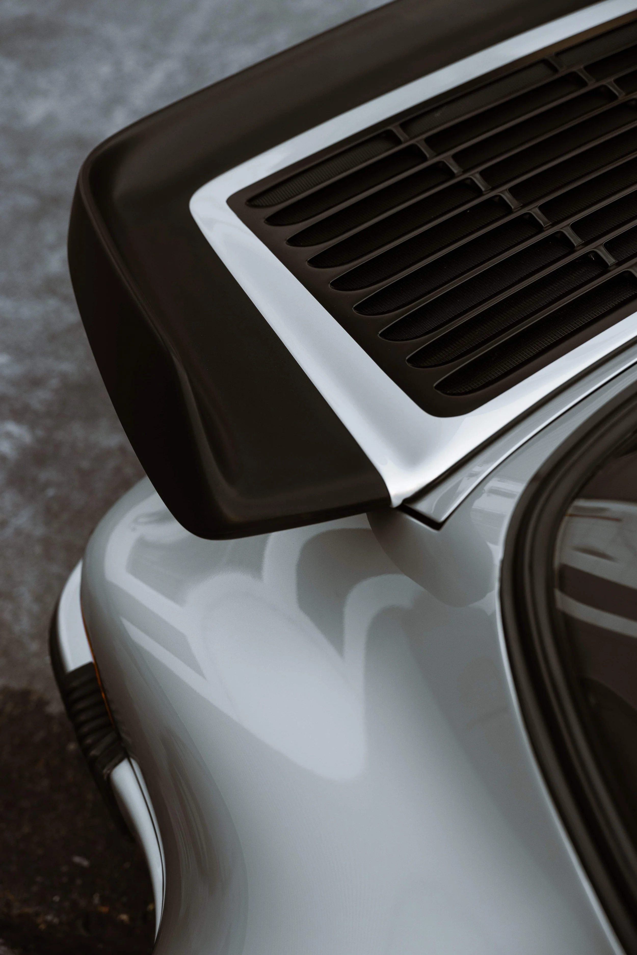 Silver 1989 Porsche 911 Carrera Targa rear spoiler and engine grille in Mona Vale