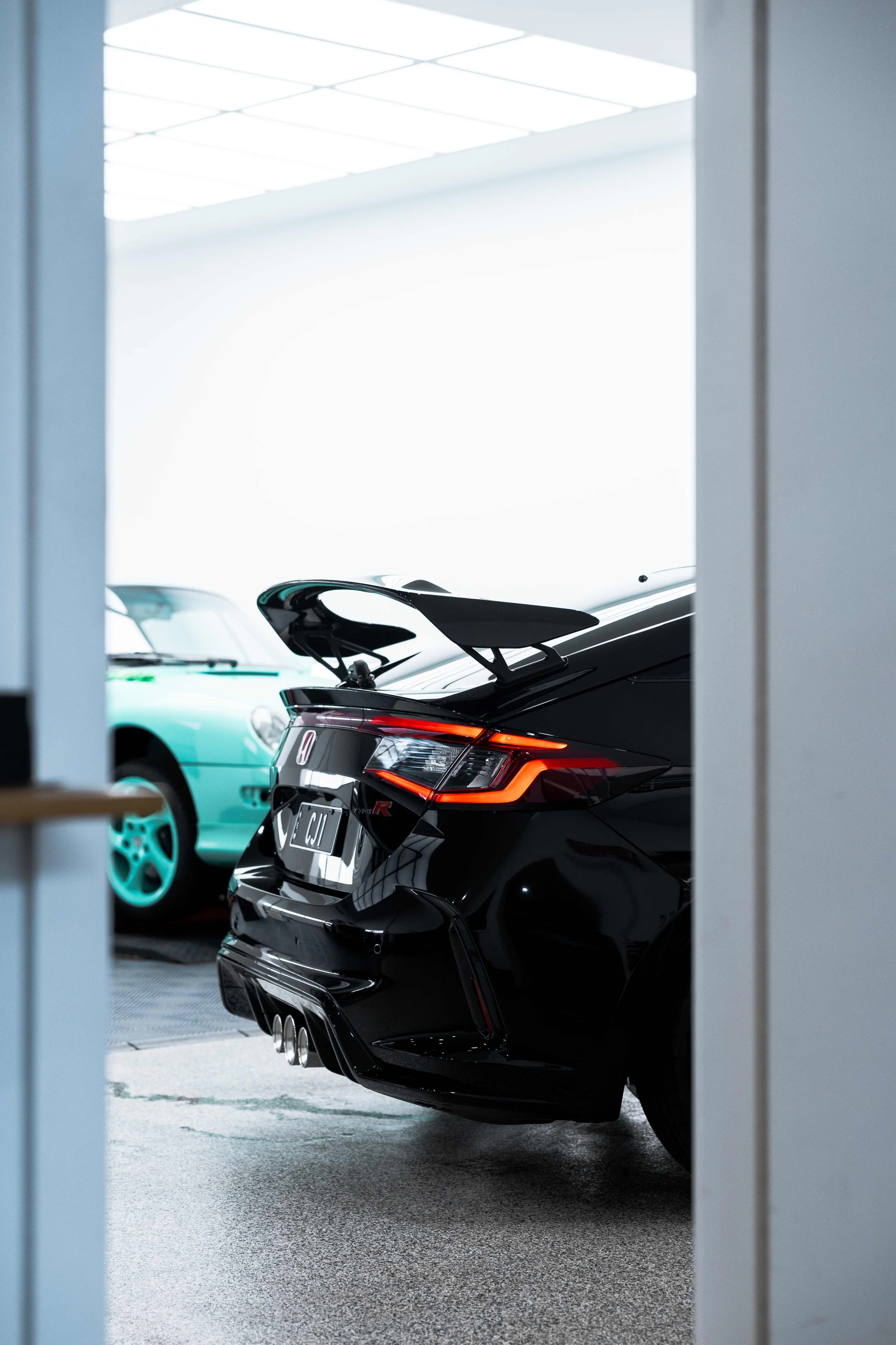 Black Honda Civic Type R rear end in ADS detailing studio in Sydney