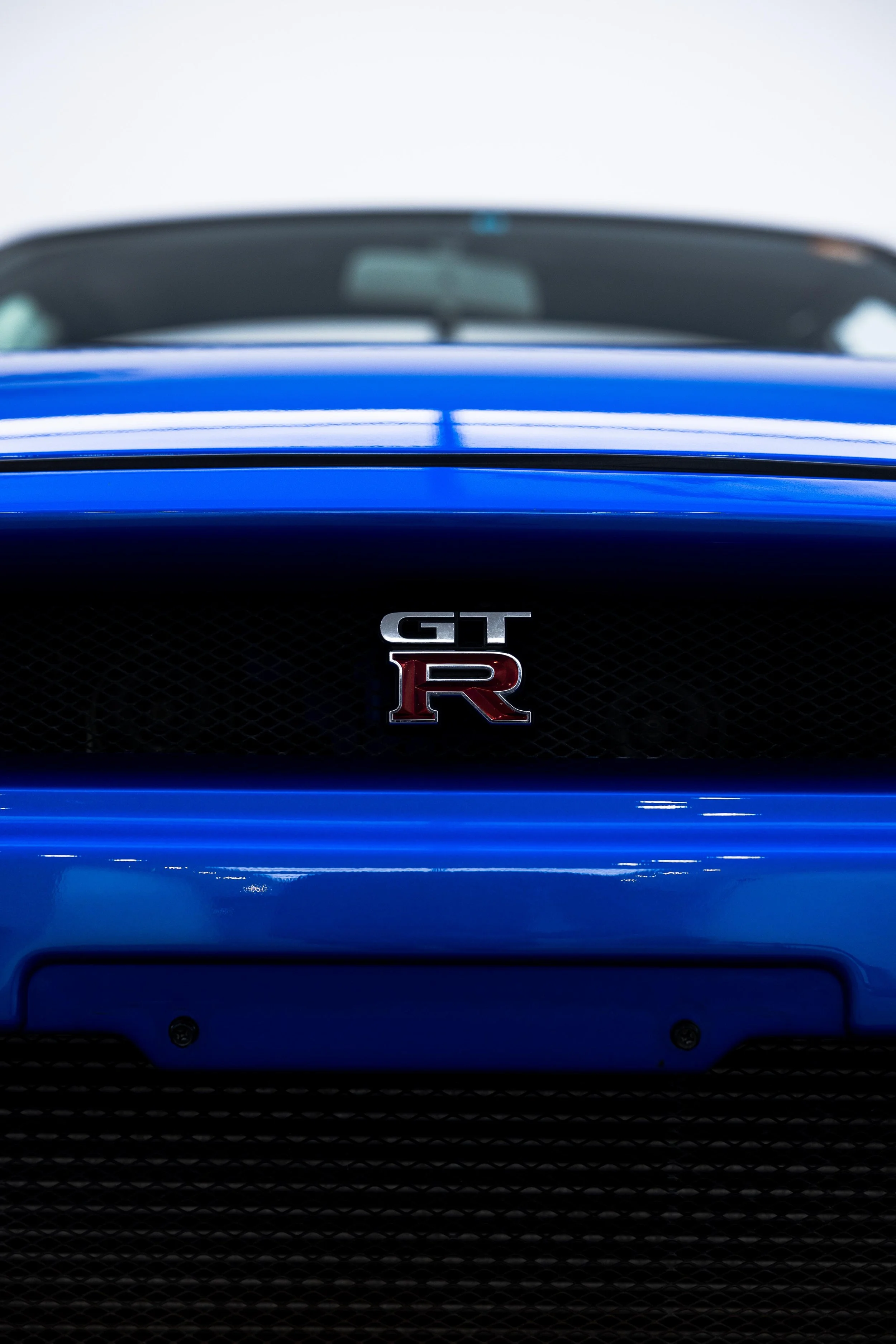 GT-R badge on Nissan R34 Nur rear with XPEL Paint Protection Film in Mona Vale