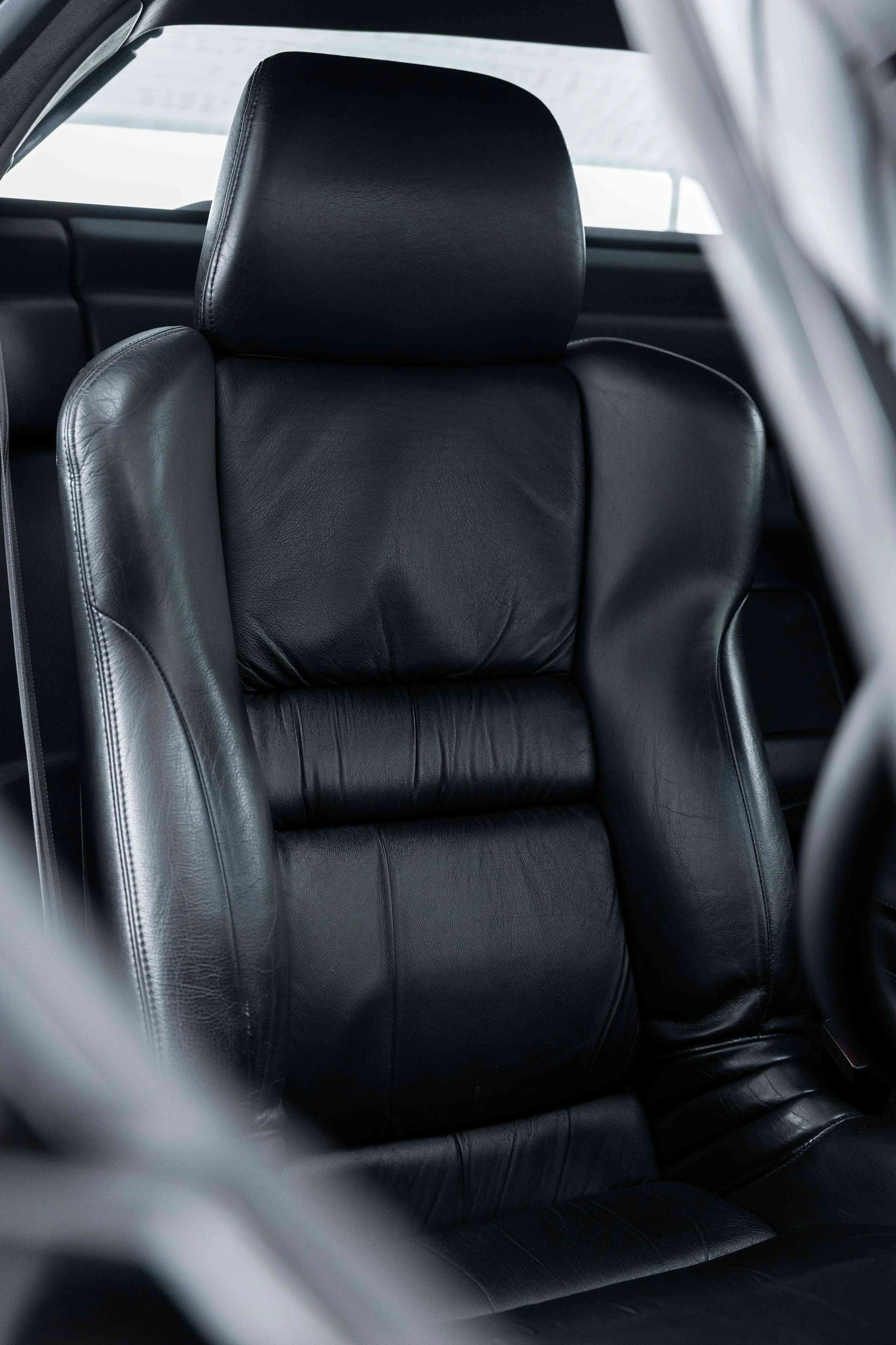 Honda NSX leather seat after interior detailing in Sydney