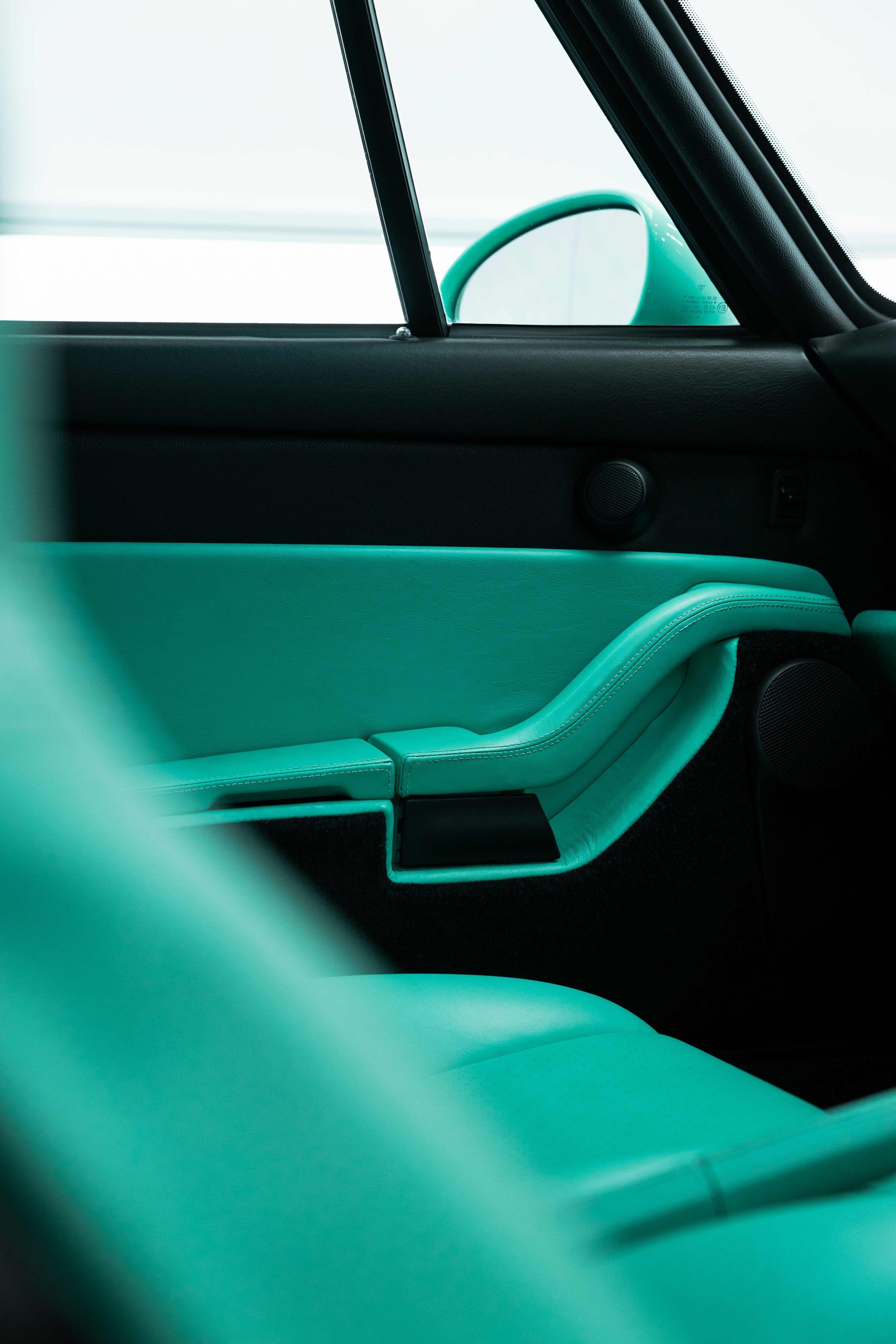 Mint green leather door trim after interior detailing in Sydney