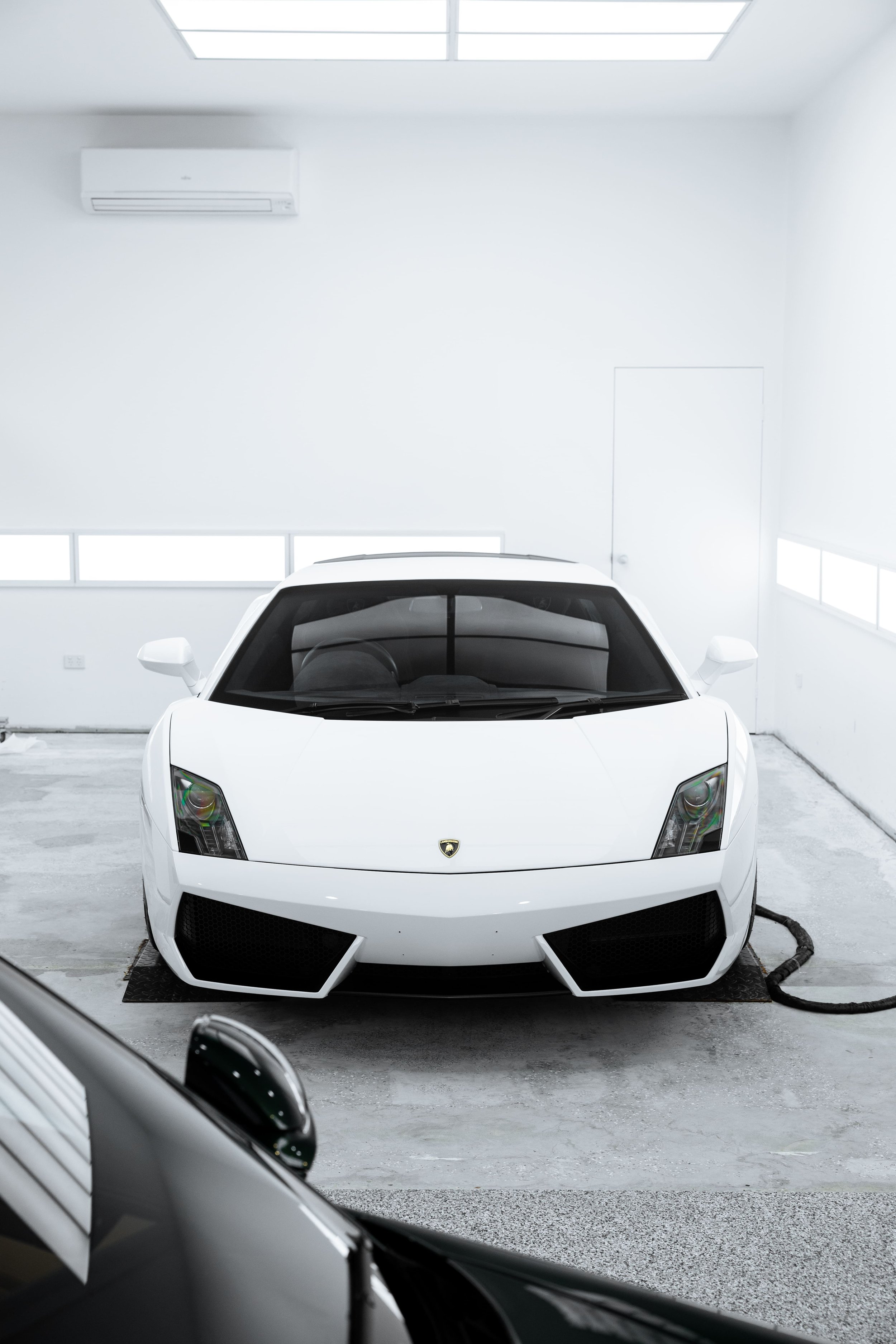 White Lamborghini Gallardo front view with full PPF by ADS in Mona Vale