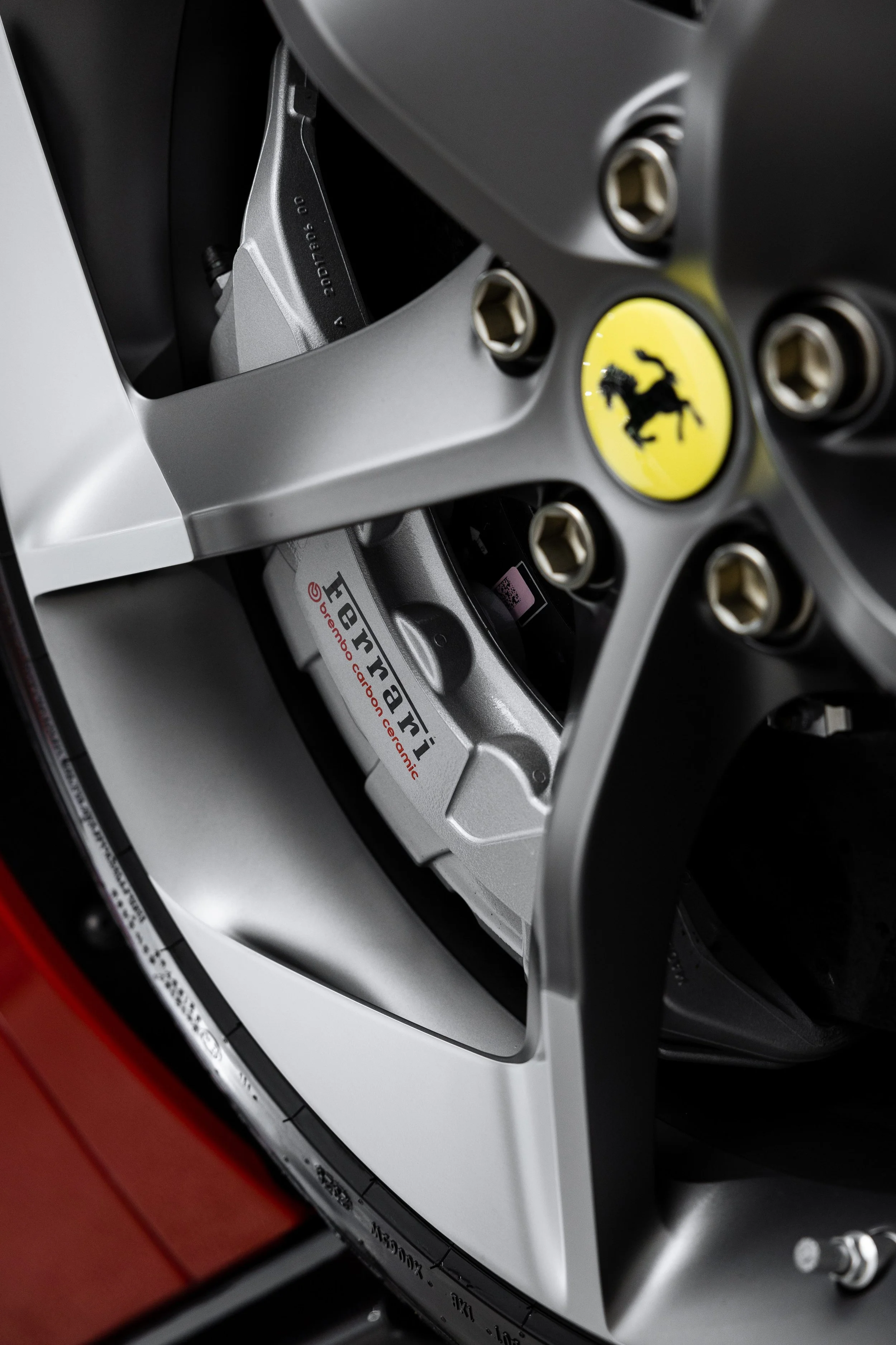 Ferrari 849 Testarossa alloy wheel and brake caliper after detailing in Mona Vale