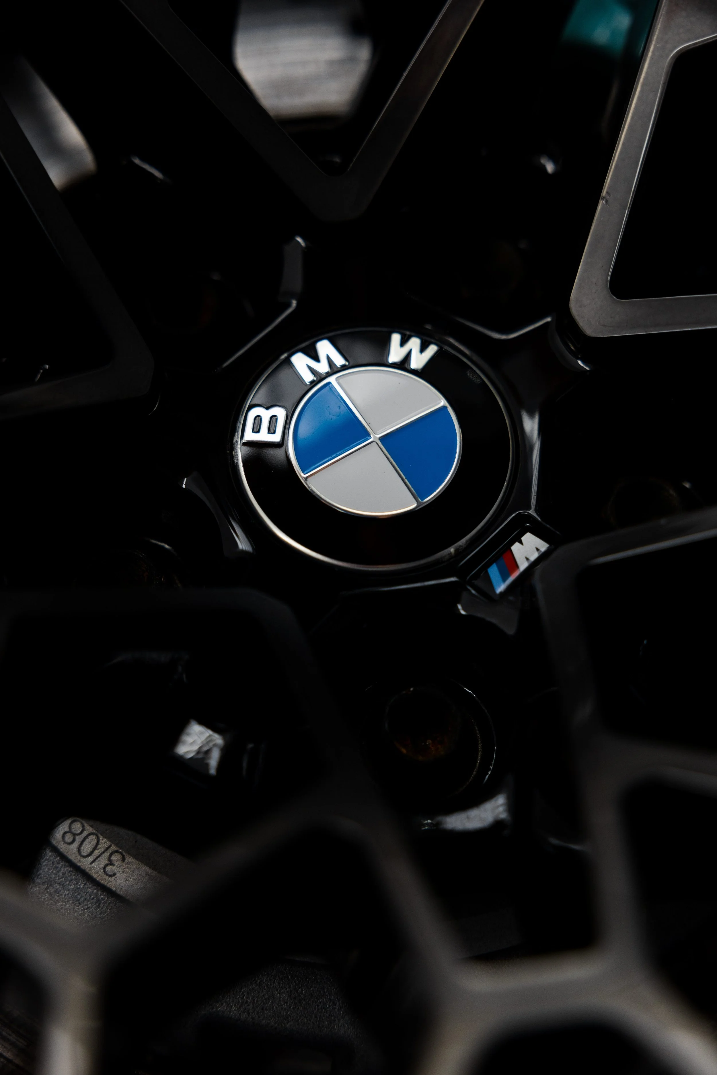 BMW M4 Competition wheel badge with XPEL Paint Protection Film in Sydney