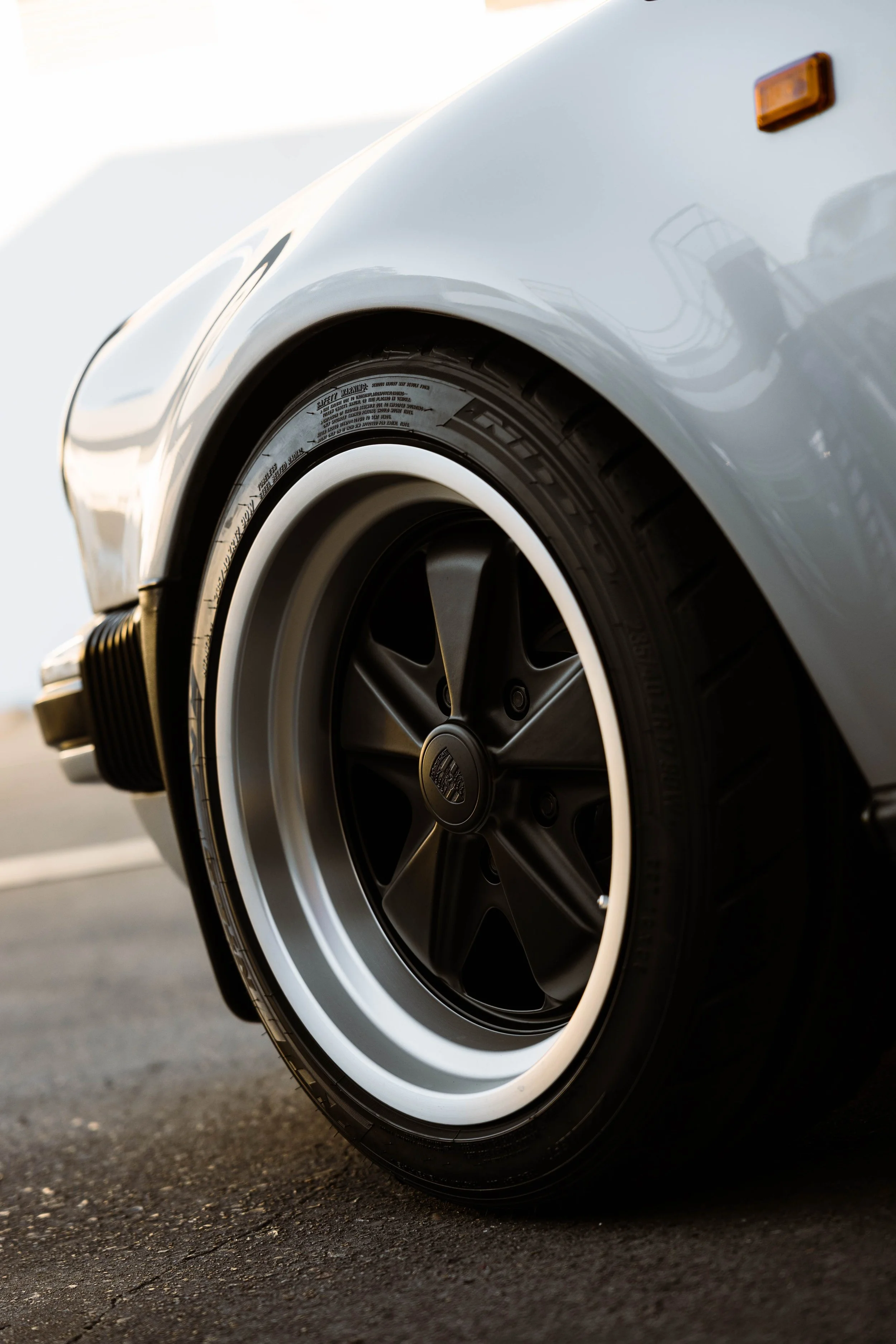 Silver 1989 Porsche 911 Carrera Targa Fuchs style wheel and guard in Mona Vale