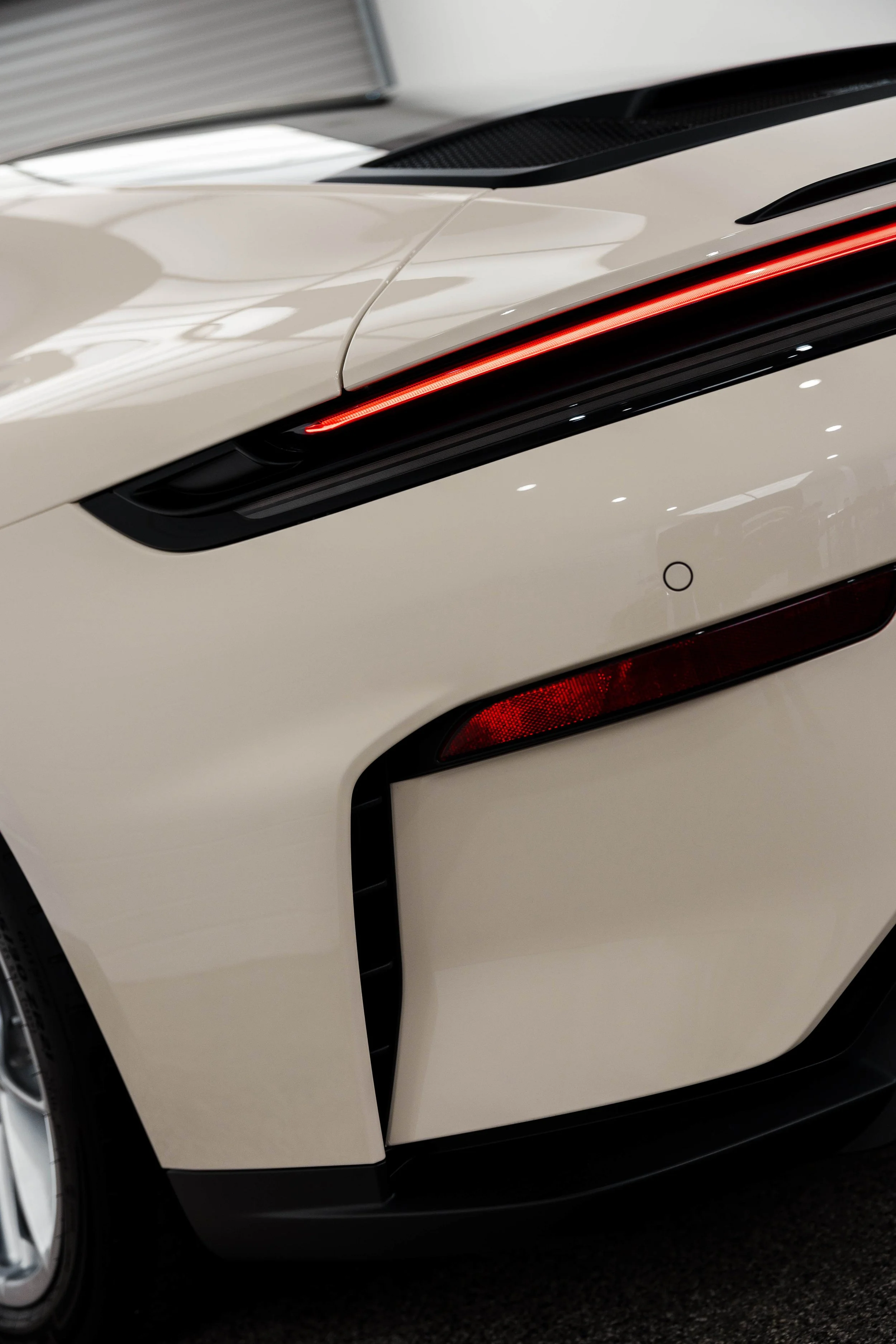 Cream Porsche 911 GT3 Touring taillight and rear quarter detail with XPEL Paint Protection Film in Mona Vale