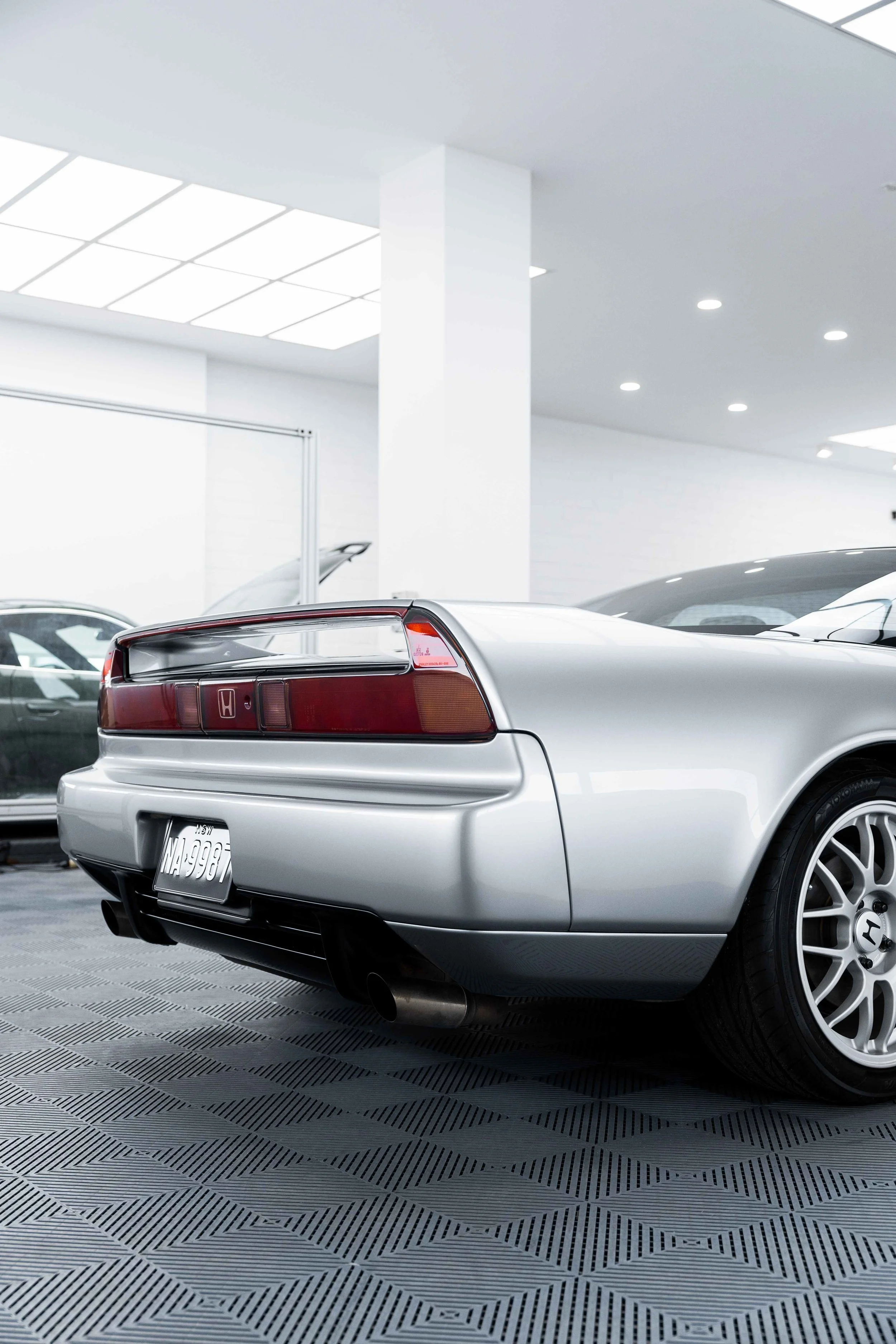 Silver Honda NSX rear bumper and tail light with XPEL Paint Protection Film in Mona Vale