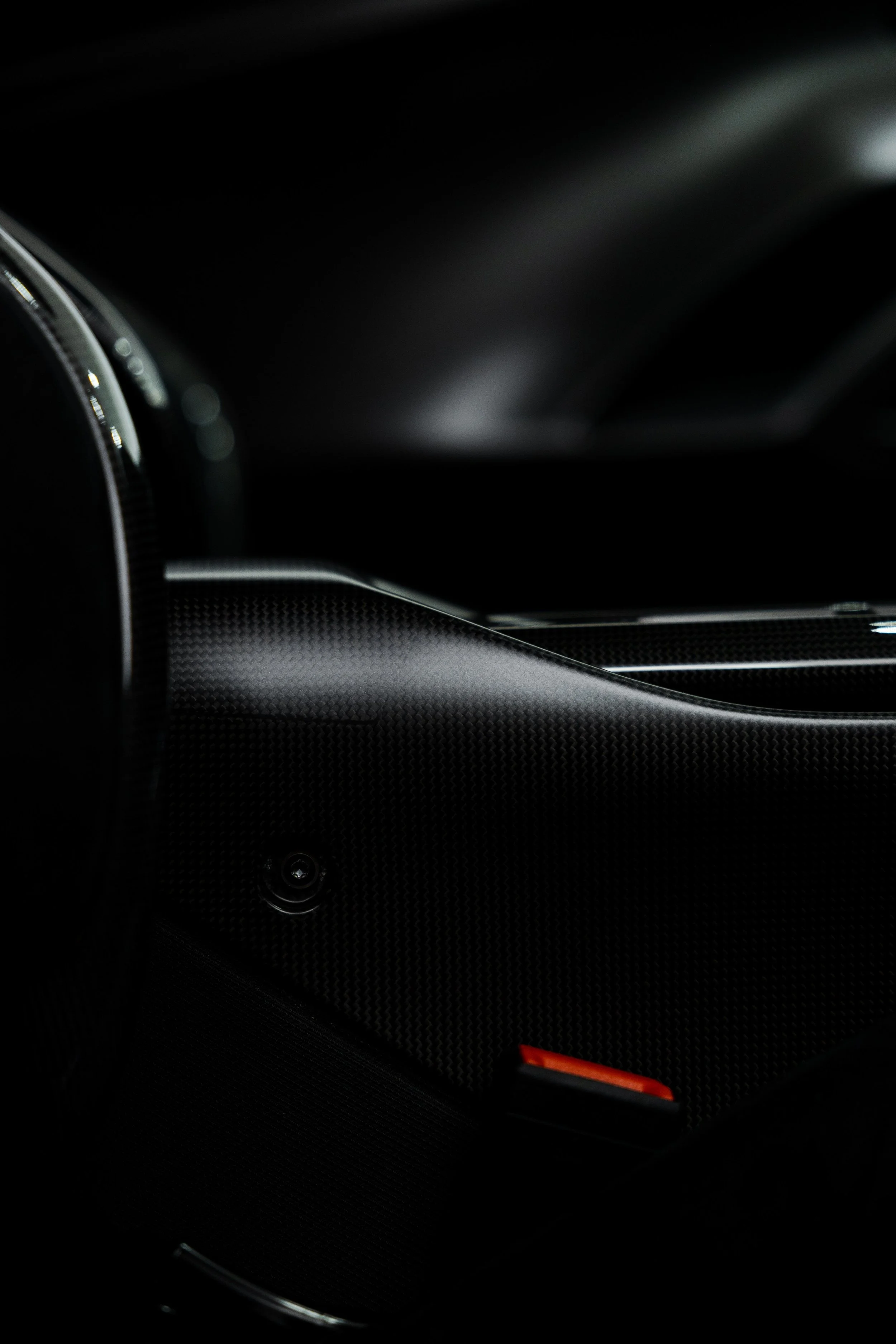 Red Ferrari 296 Speciale interior detailing carbon fibre dashboard trim in Mona Vale