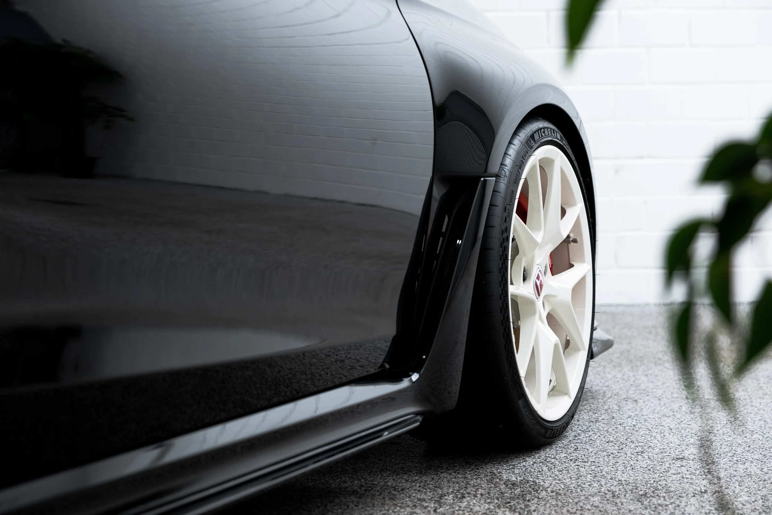 Black Honda Civic Type R side skirt and wheel with XPEL Paint Protection Film in Mona Vale