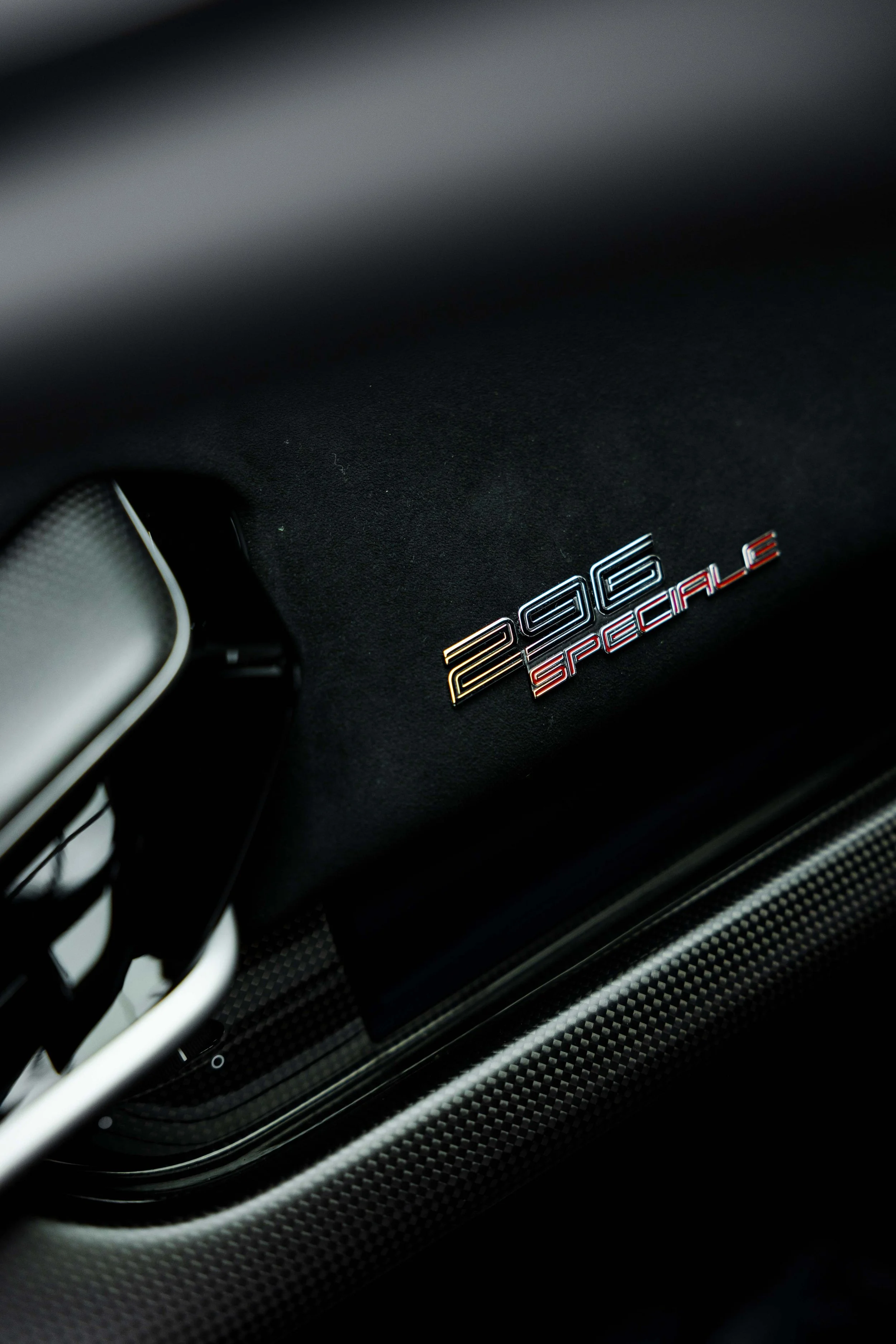 Red Ferrari 296 Speciale interior detailing 296 Speciale badge on dashboard in Sydney