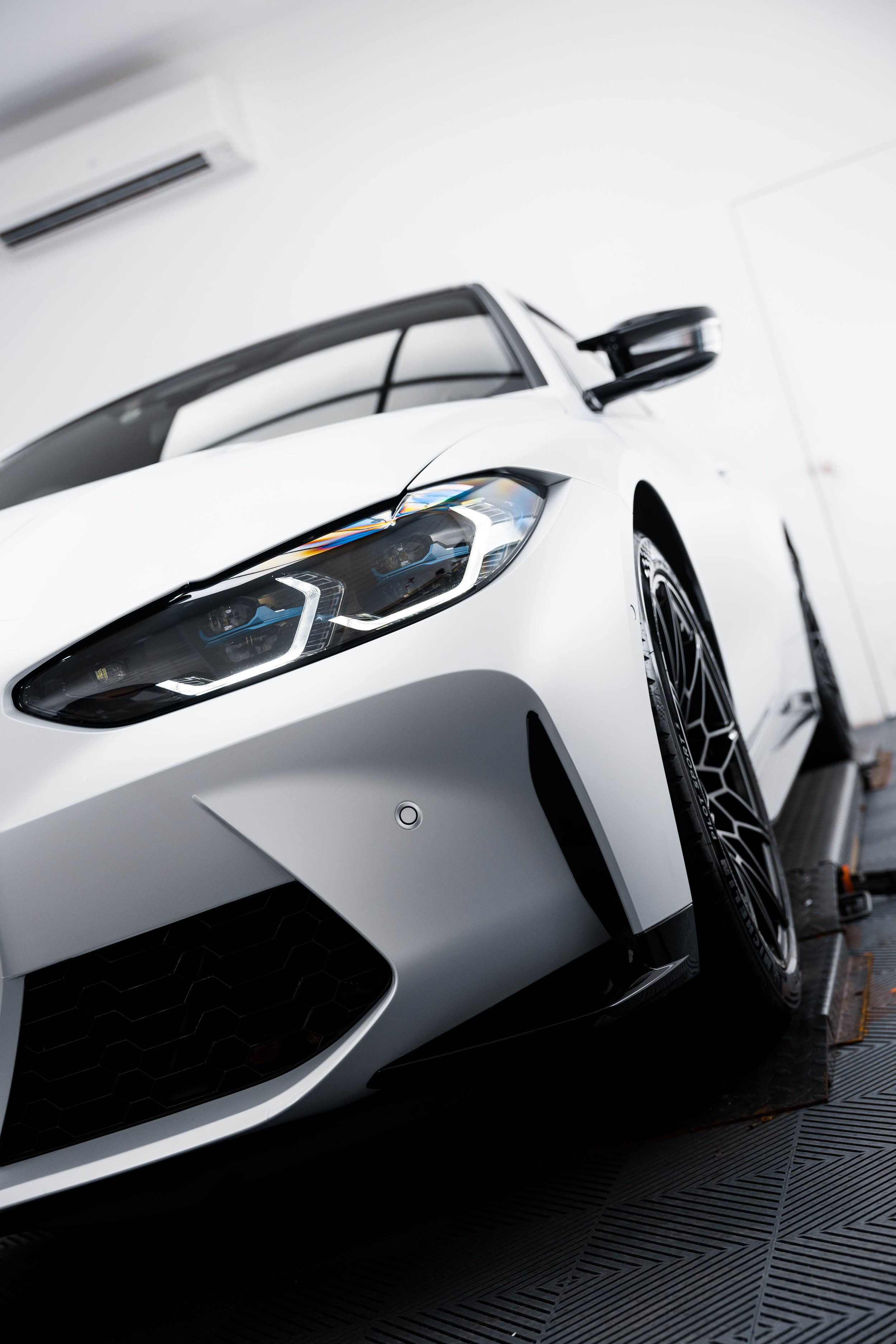 White BMW M4 Competition front end with XPEL Paint Protection Film in Sydney